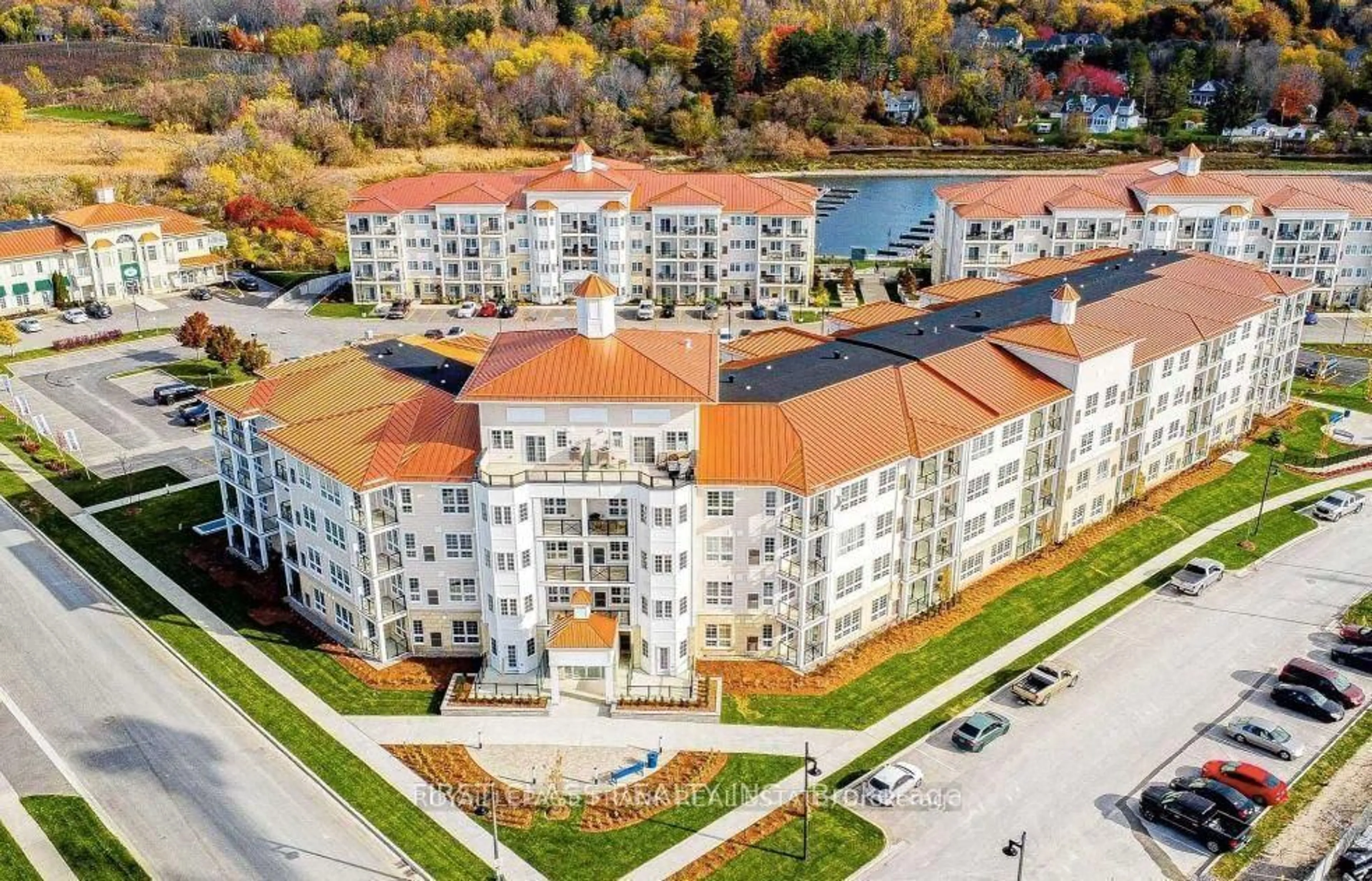 A pic from outside/outdoor area/front of a property/back of a property/a pic from drone, building for 50 Lakebreeze Dr #317, Clarington Ontario L1B 0V9