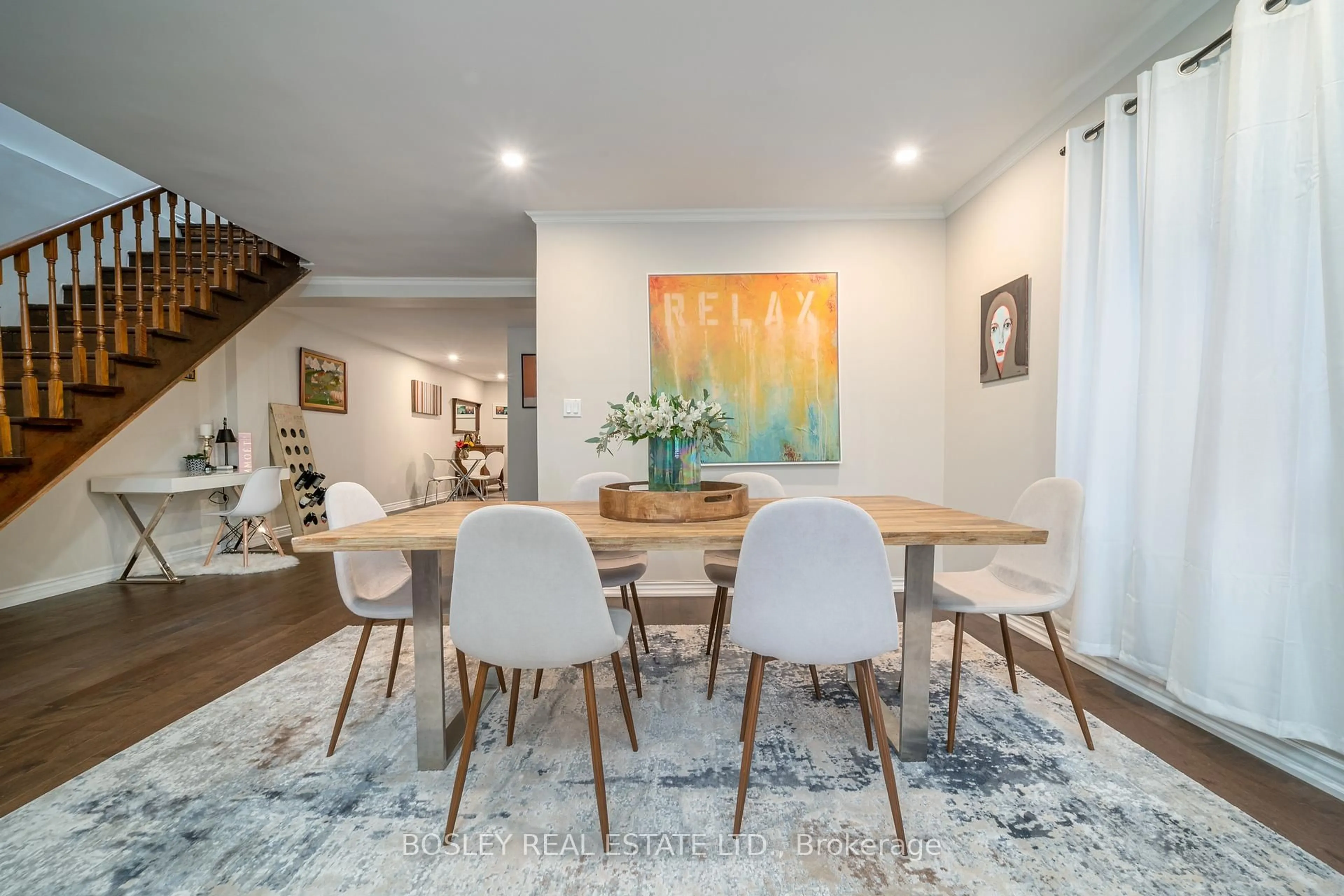 Dining room, wood/laminate floor for 386 Lumsden Ave, Toronto Ontario M4C 2L6
