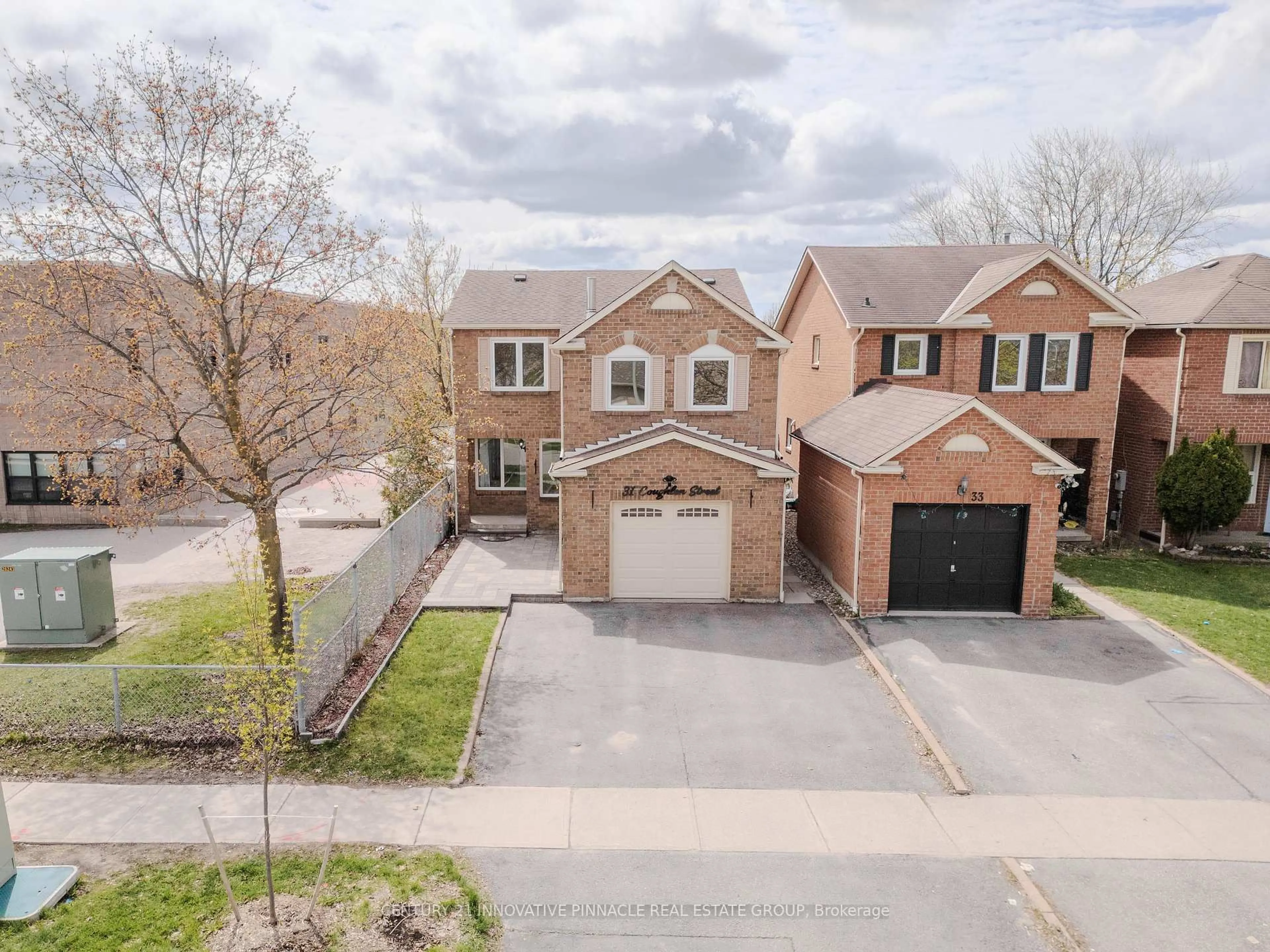 A pic from outside/outdoor area/front of a property/back of a property/a pic from drone, street for 31 Coughlen St, Ajax Ontario L1T 2M9