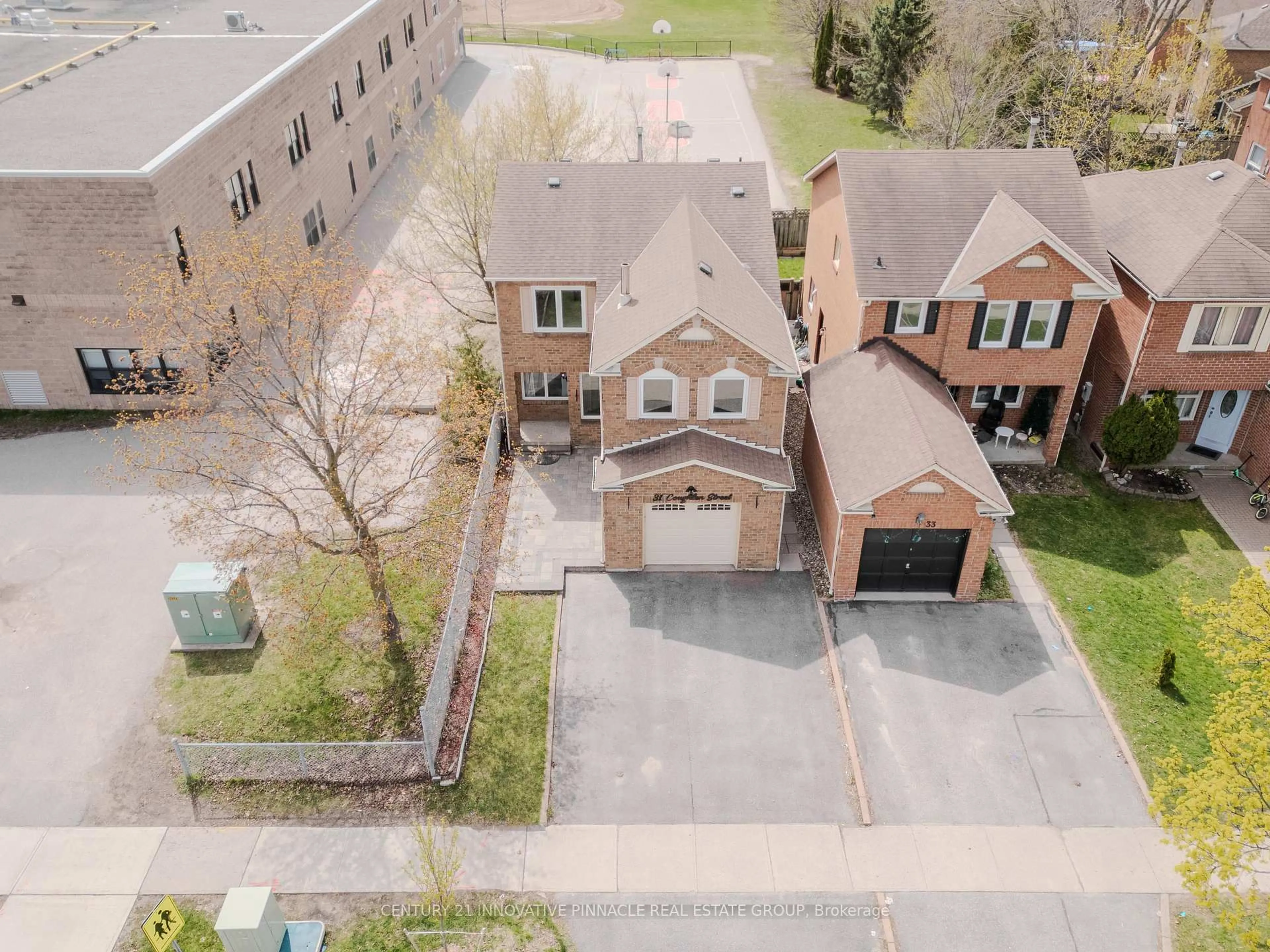 A pic from outside/outdoor area/front of a property/back of a property/a pic from drone, street for 31 Coughlen St, Ajax Ontario L1T 2M9