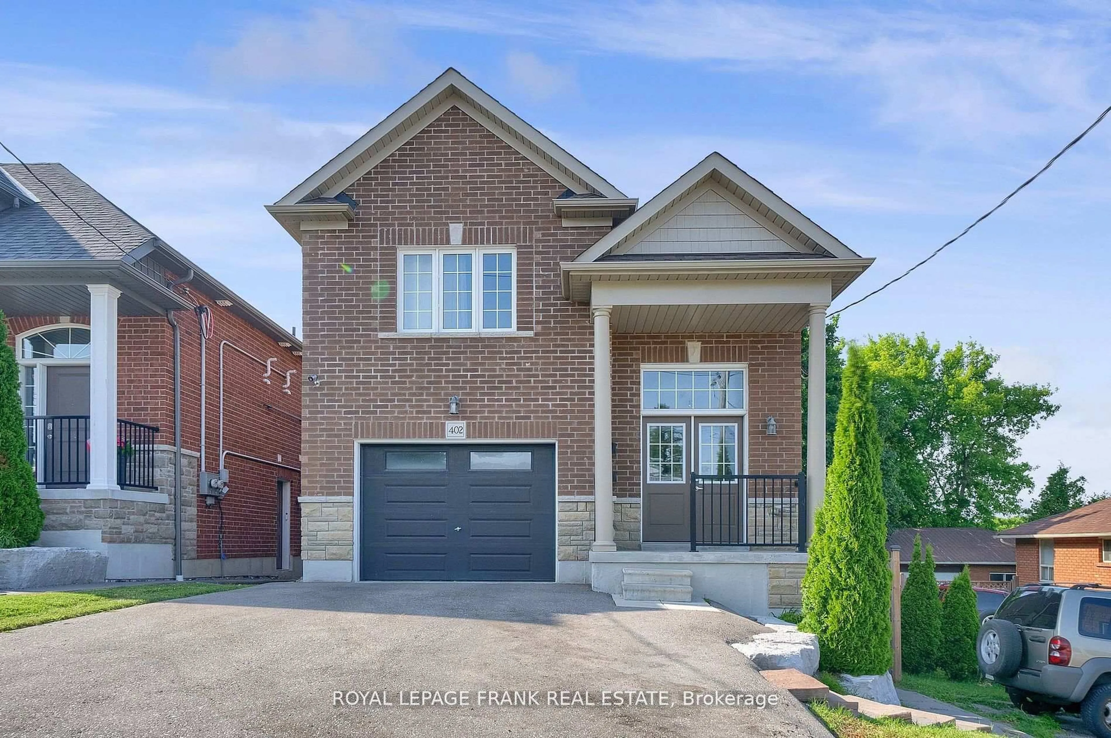 Home with brick exterior material, street for 402 Olive Ave, Oshawa Ontario L1H 2R1