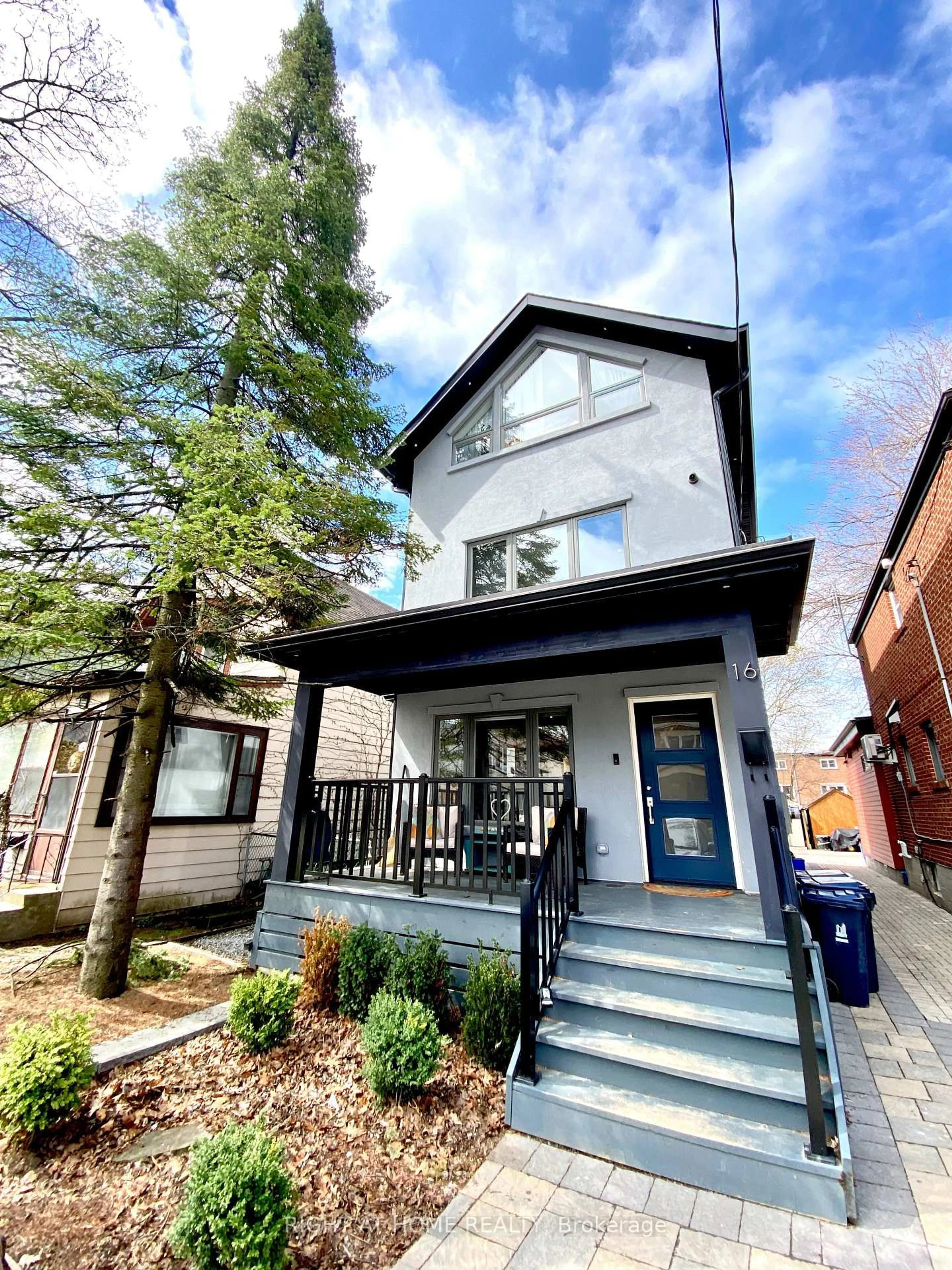 Home with brick exterior material, street for 16 Woodlee Rd, Toronto Ontario M4E 2R1