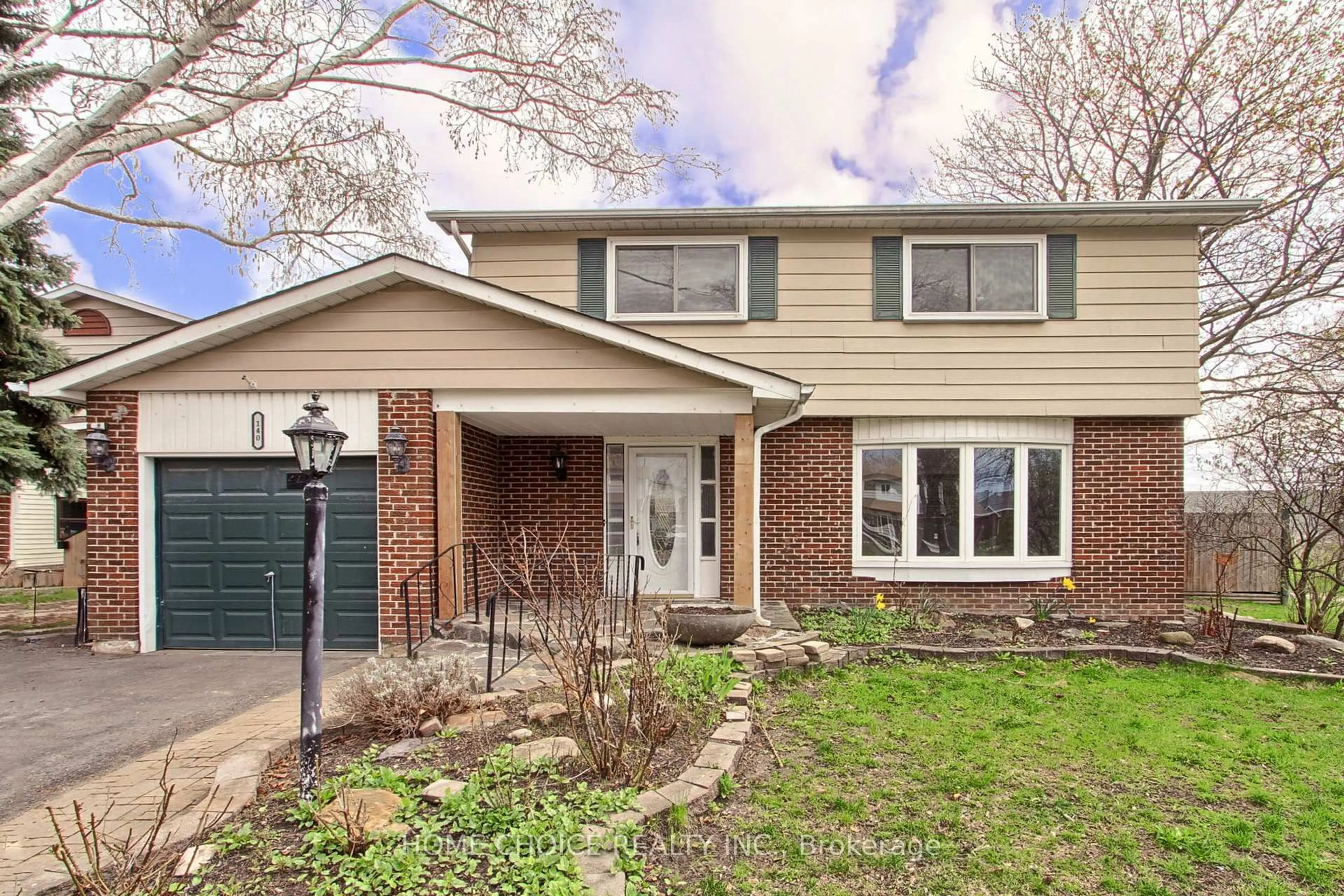 Home with brick exterior material, street for 140 Michael Blvd, Whitby Ontario L1N 5Z2