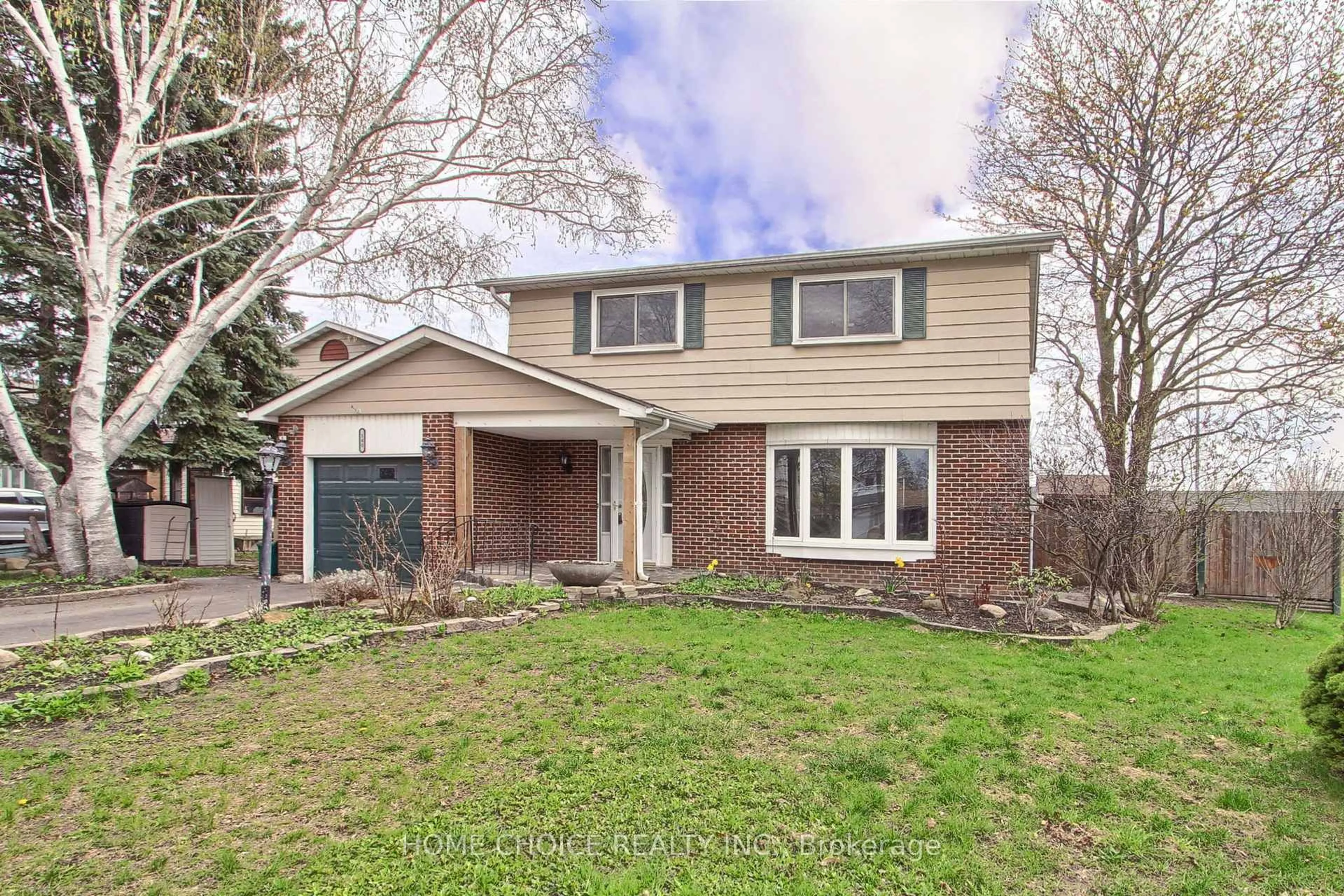 Home with brick exterior material, street for 140 Michael Blvd, Whitby Ontario L1N 5Z2