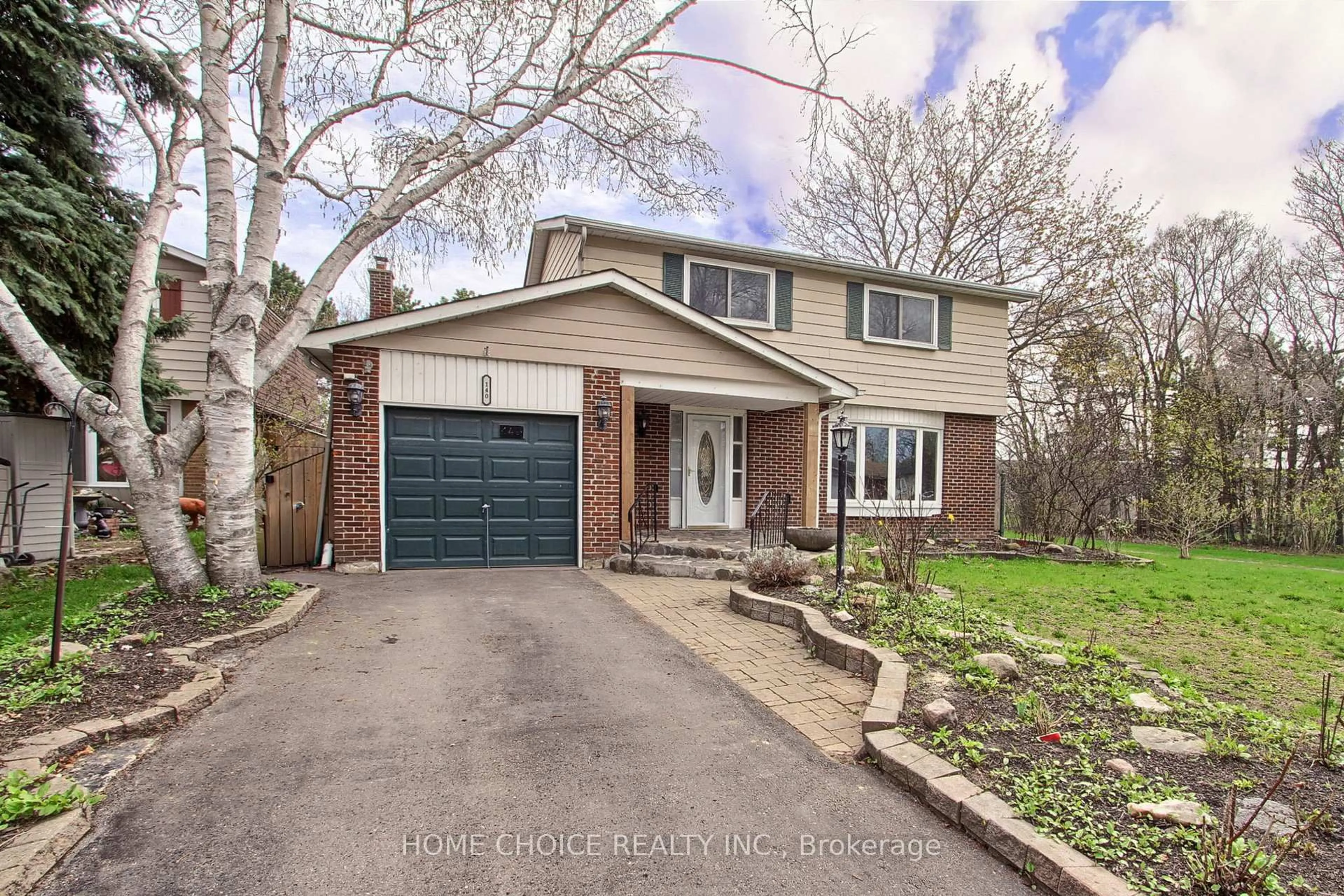 Home with brick exterior material, street for 140 Michael Blvd, Whitby Ontario L1N 5Z2