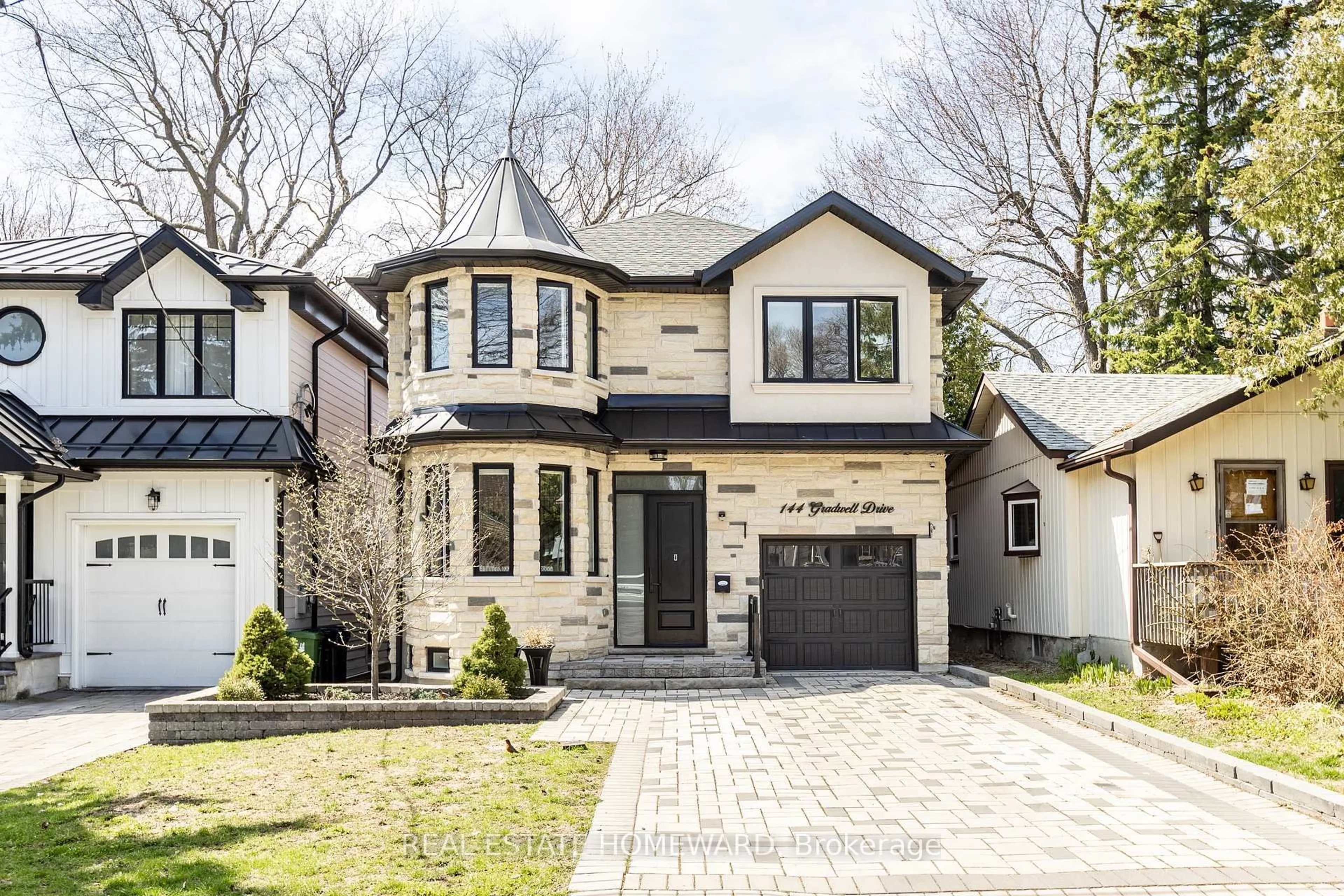 Home with brick exterior material, street for 144 Gradwell Dr, Toronto Ontario M1M 2N2