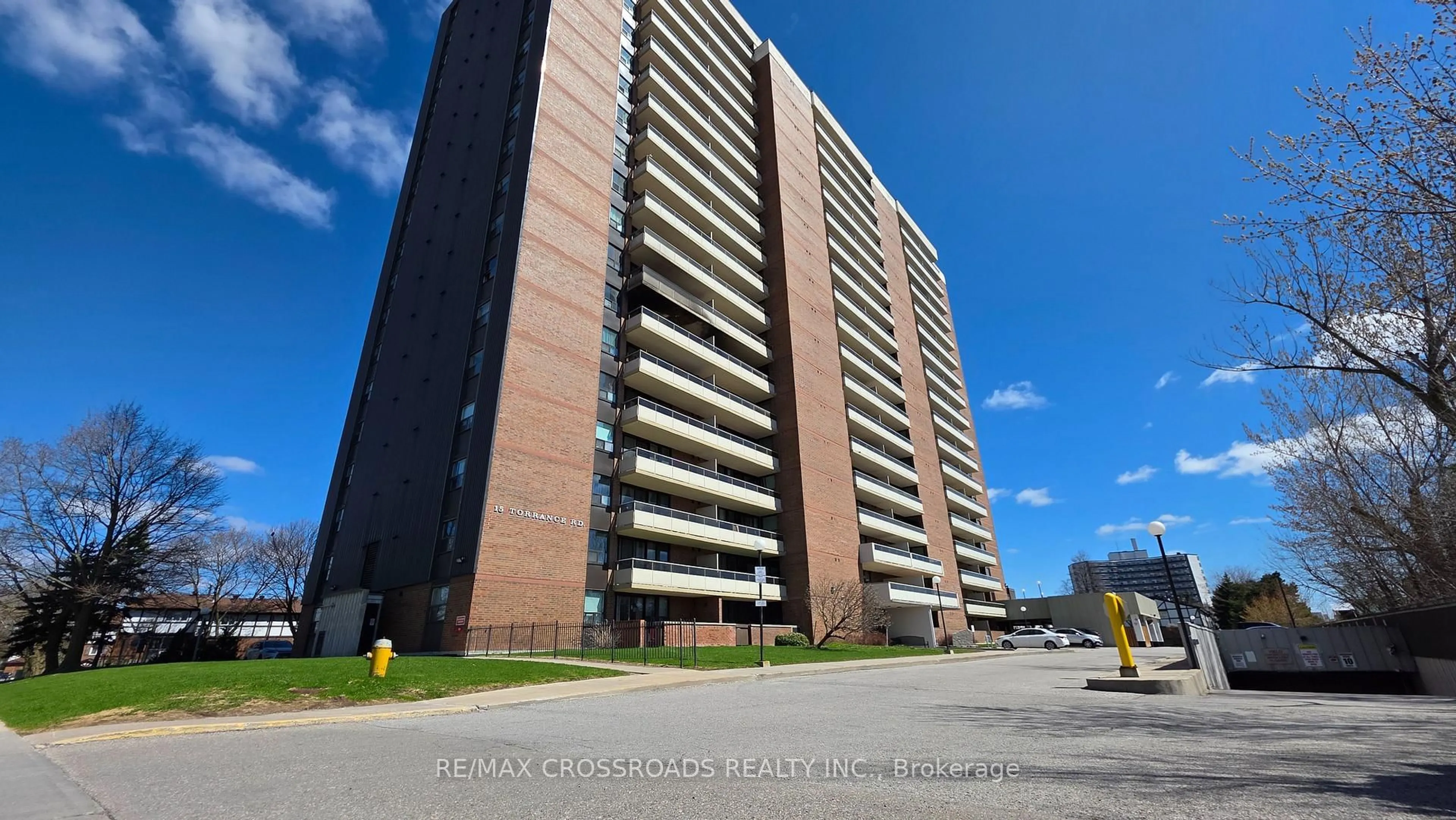 A pic from outside/outdoor area/front of a property/back of a property/a pic from drone, building for 15 Torrance Rd #406, Toronto Ontario M1J 3K2