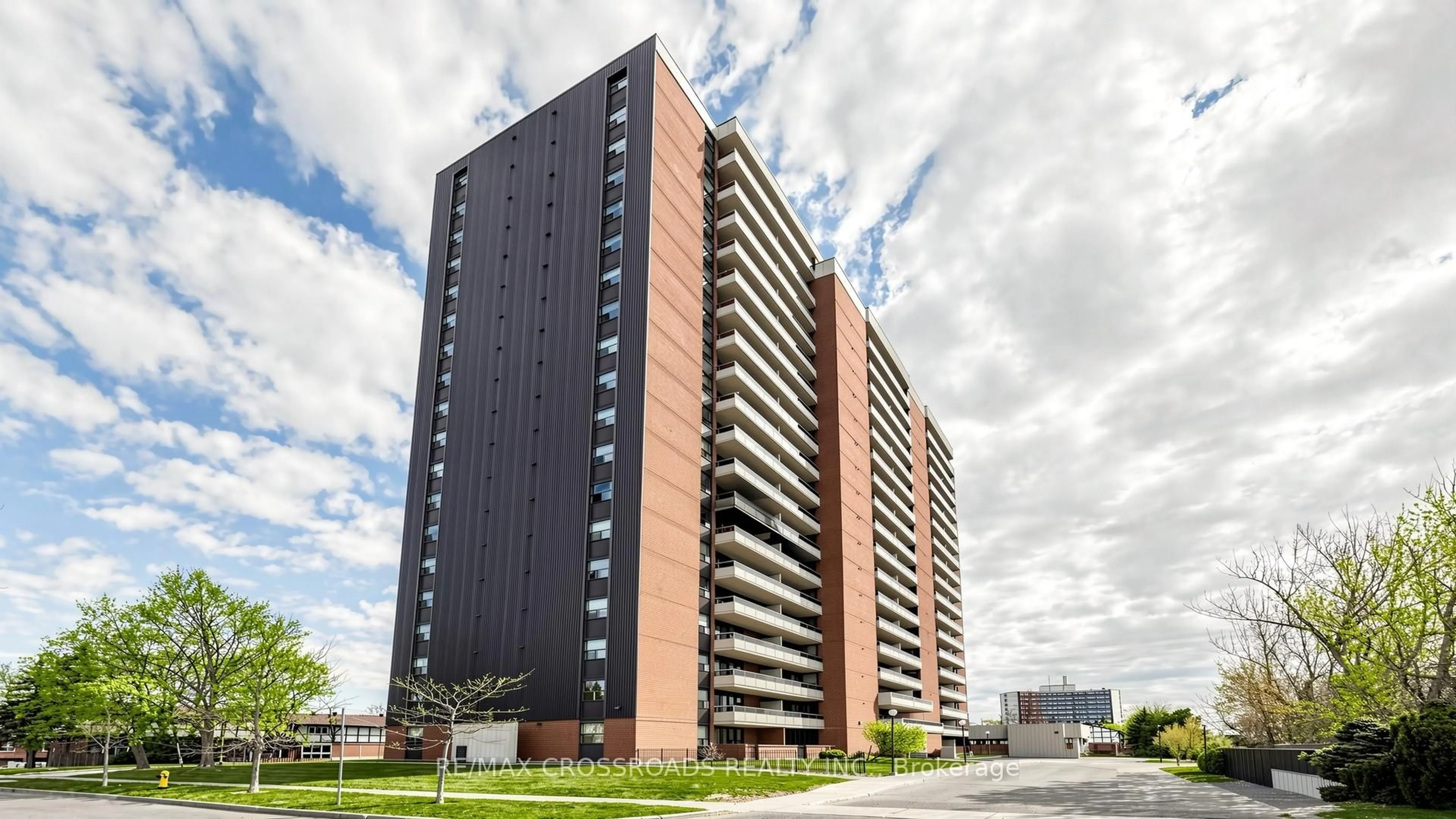 A pic from outside/outdoor area/front of a property/back of a property/a pic from drone, building for 15 Torrance Rd #406, Toronto Ontario M1J 3K2