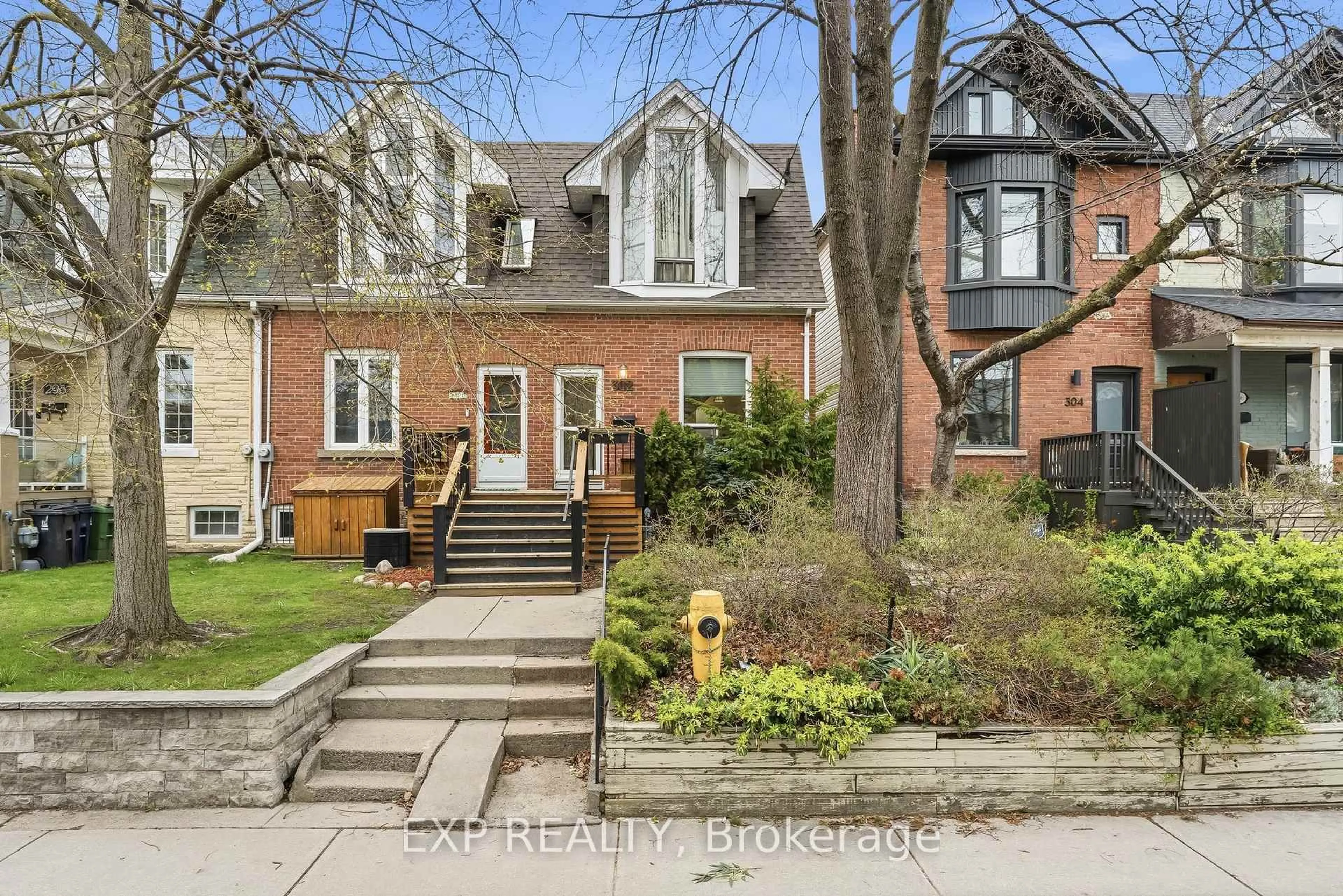 Home with brick exterior material, street for 302 Bain Ave, Toronto Ontario M4J 1B8