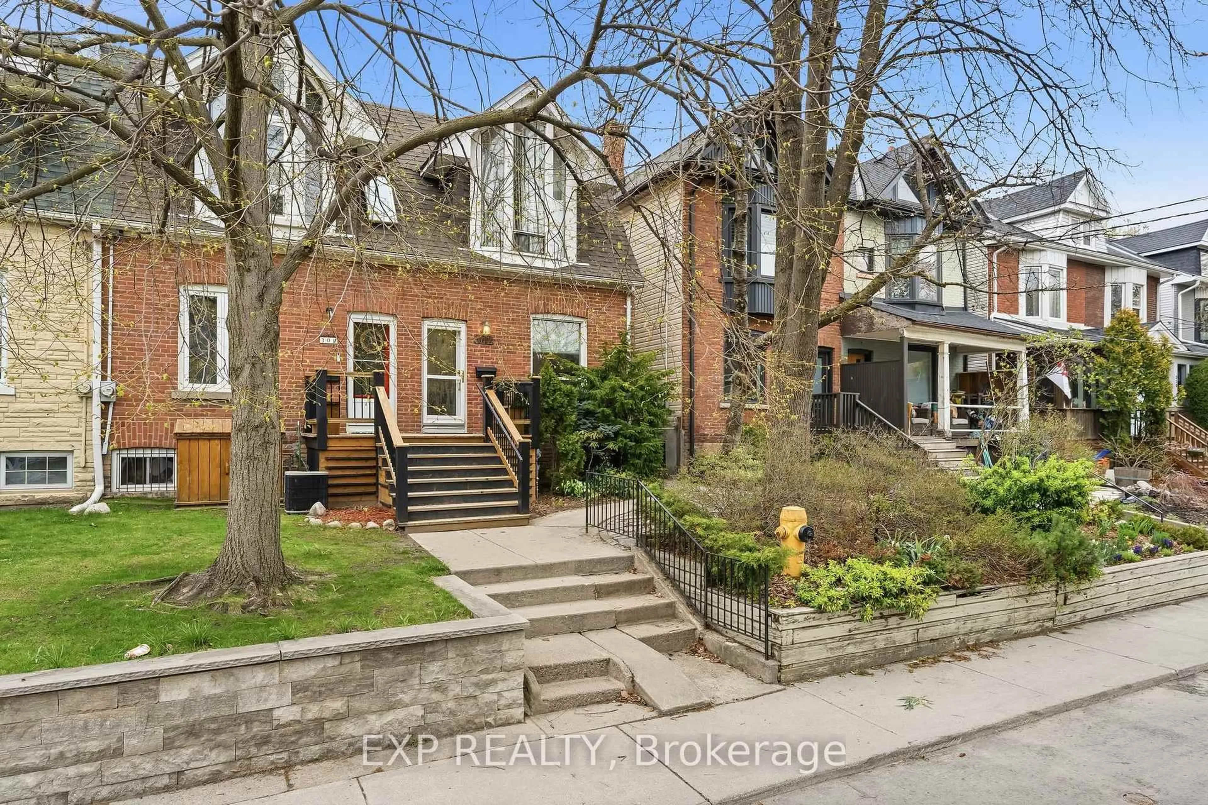 Home with brick exterior material, street for 302 Bain Ave, Toronto Ontario M4J 1B8