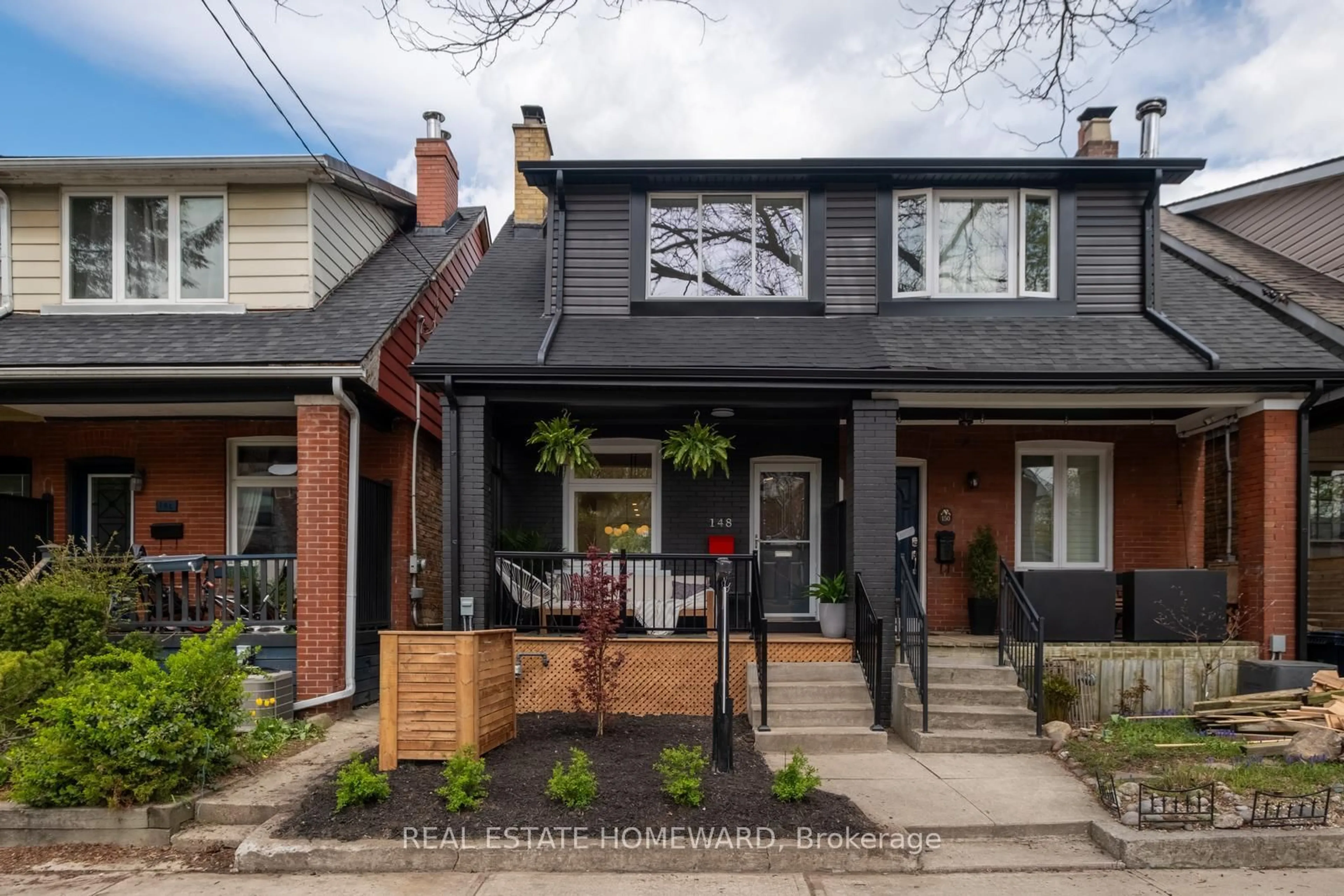 Home with brick exterior material, street for 148 Mountjoy Ave, Toronto Ontario M4J 1K2