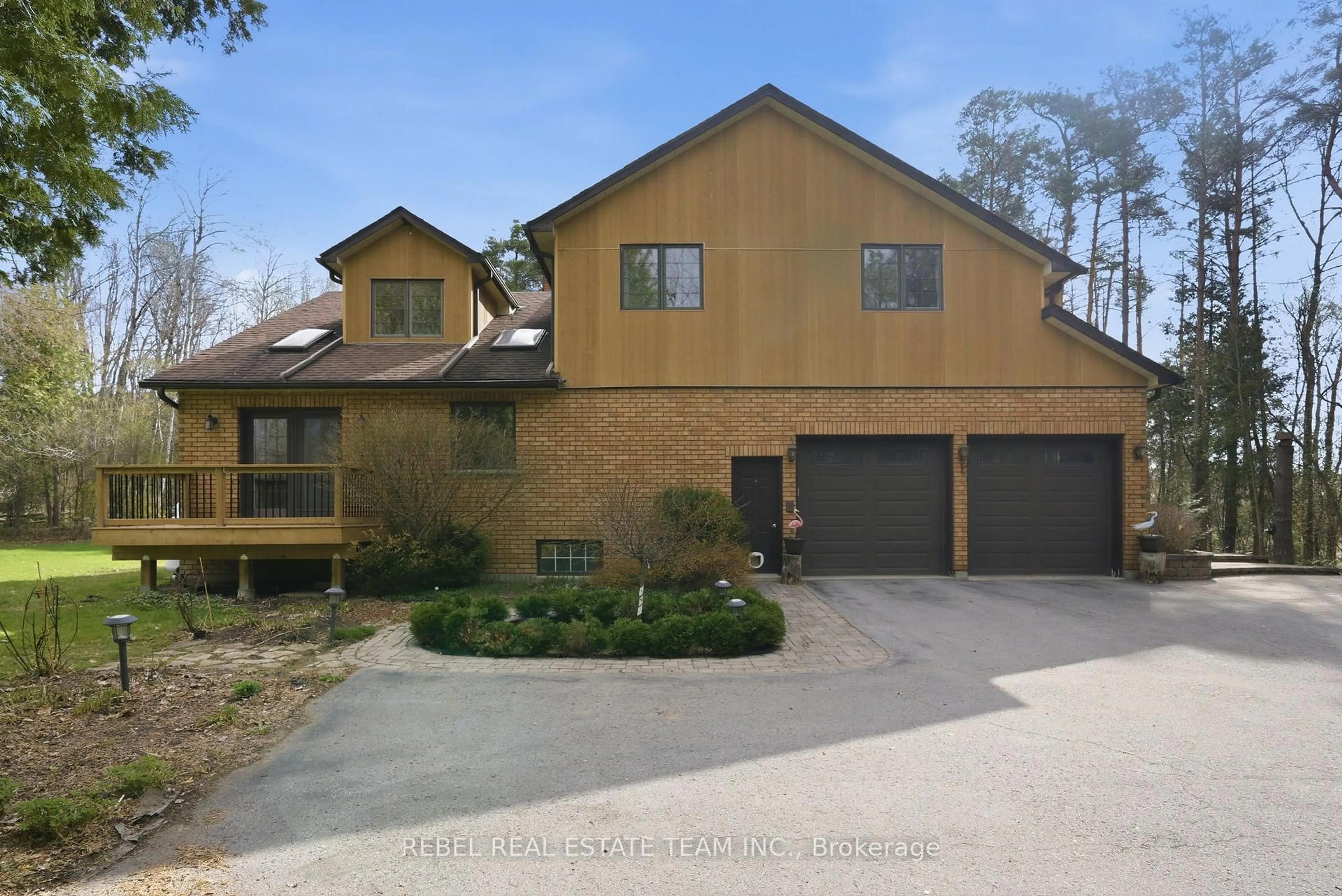 Home with brick exterior material, street for 21 Stone Sound, Scugog Ontario L9L 1P5