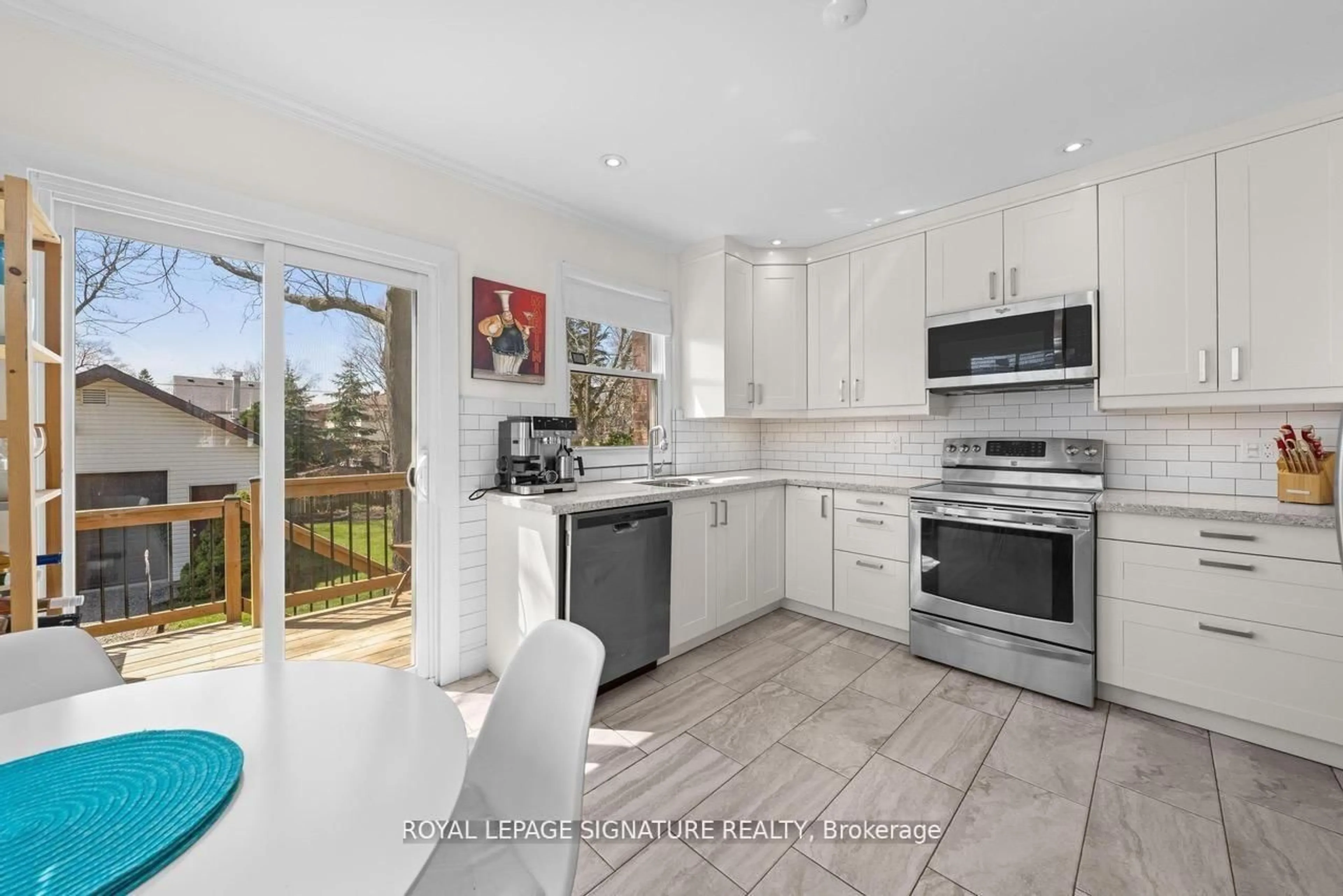 Open concept kitchen, ceramic/tile floor for 8 Wolcott Ave, Toronto Ontario M1L 4K1