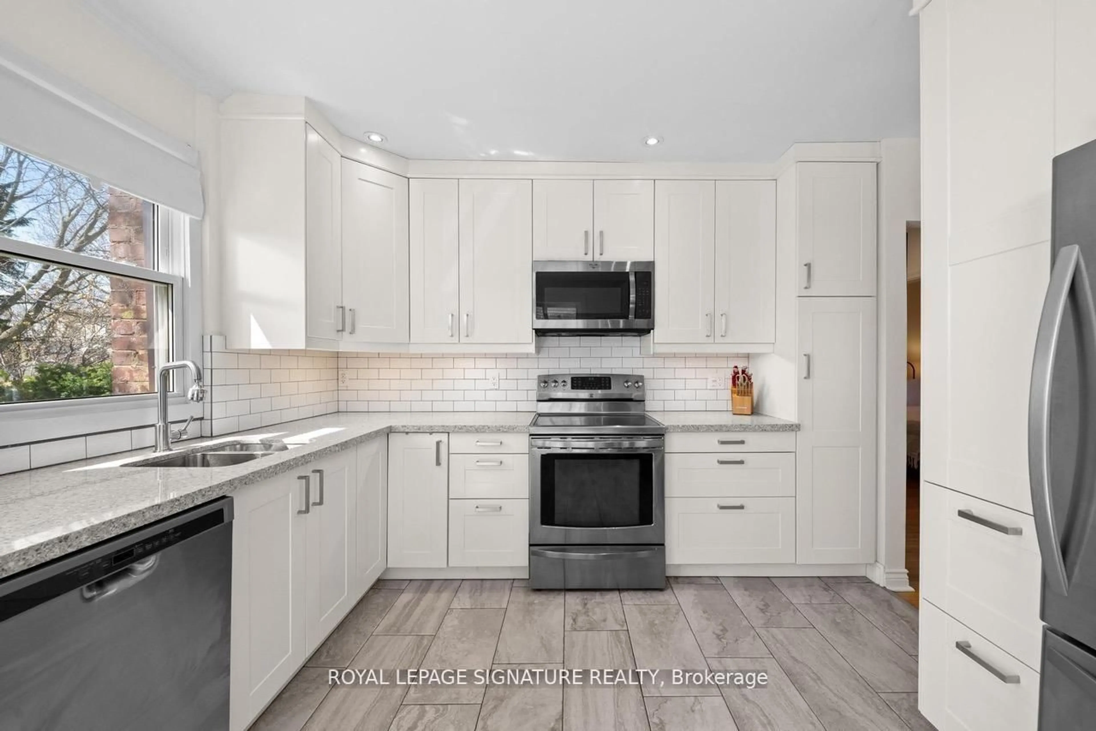 Open concept kitchen, ceramic/tile floor for 8 Wolcott Ave, Toronto Ontario M1L 4K1