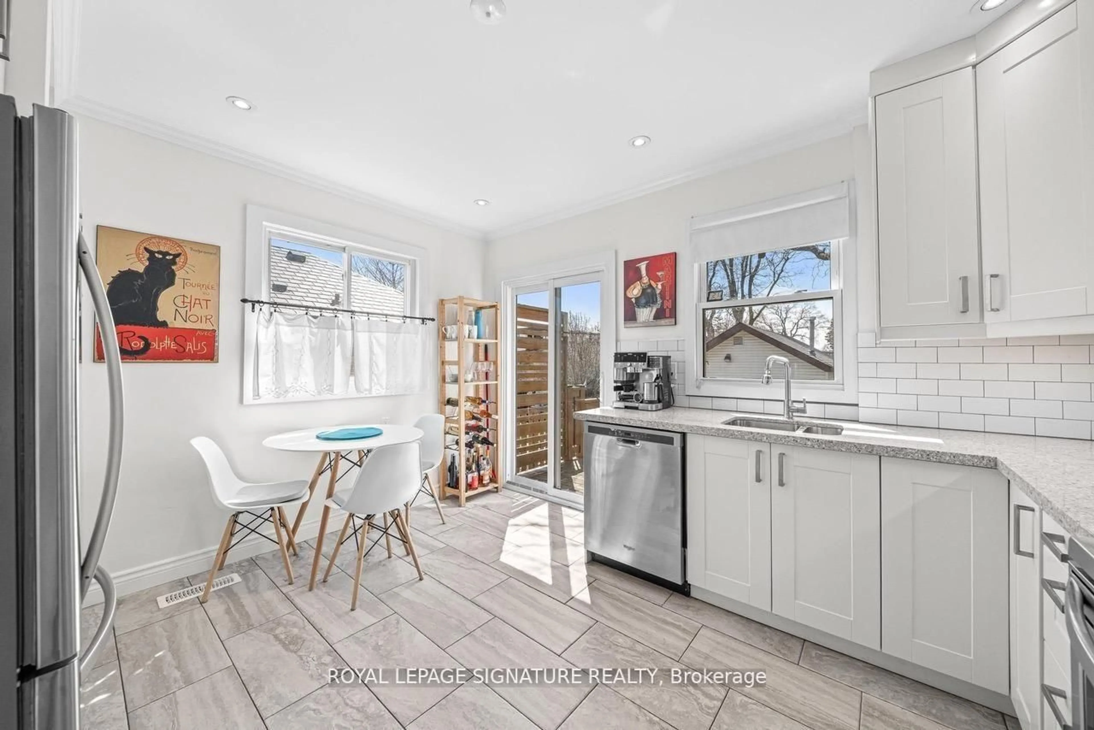 Open concept kitchen, ceramic/tile floor for 8 Wolcott Ave, Toronto Ontario M1L 4K1
