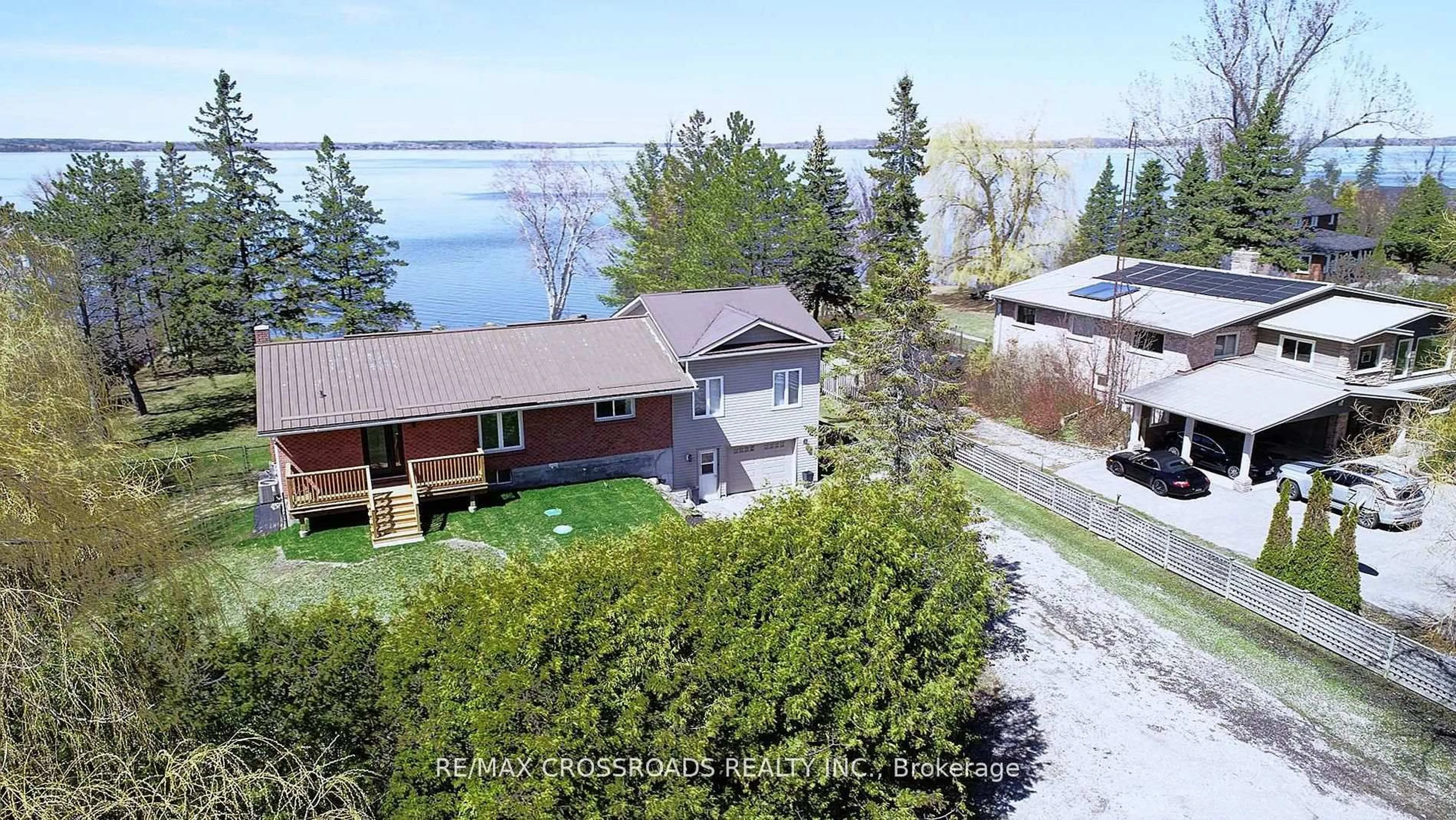 A pic from outside/outdoor area/front of a property/back of a property/a pic from drone, water/lake/river/ocean view for 8 Williams Point Rd, Scugog Ontario L0B 1E0