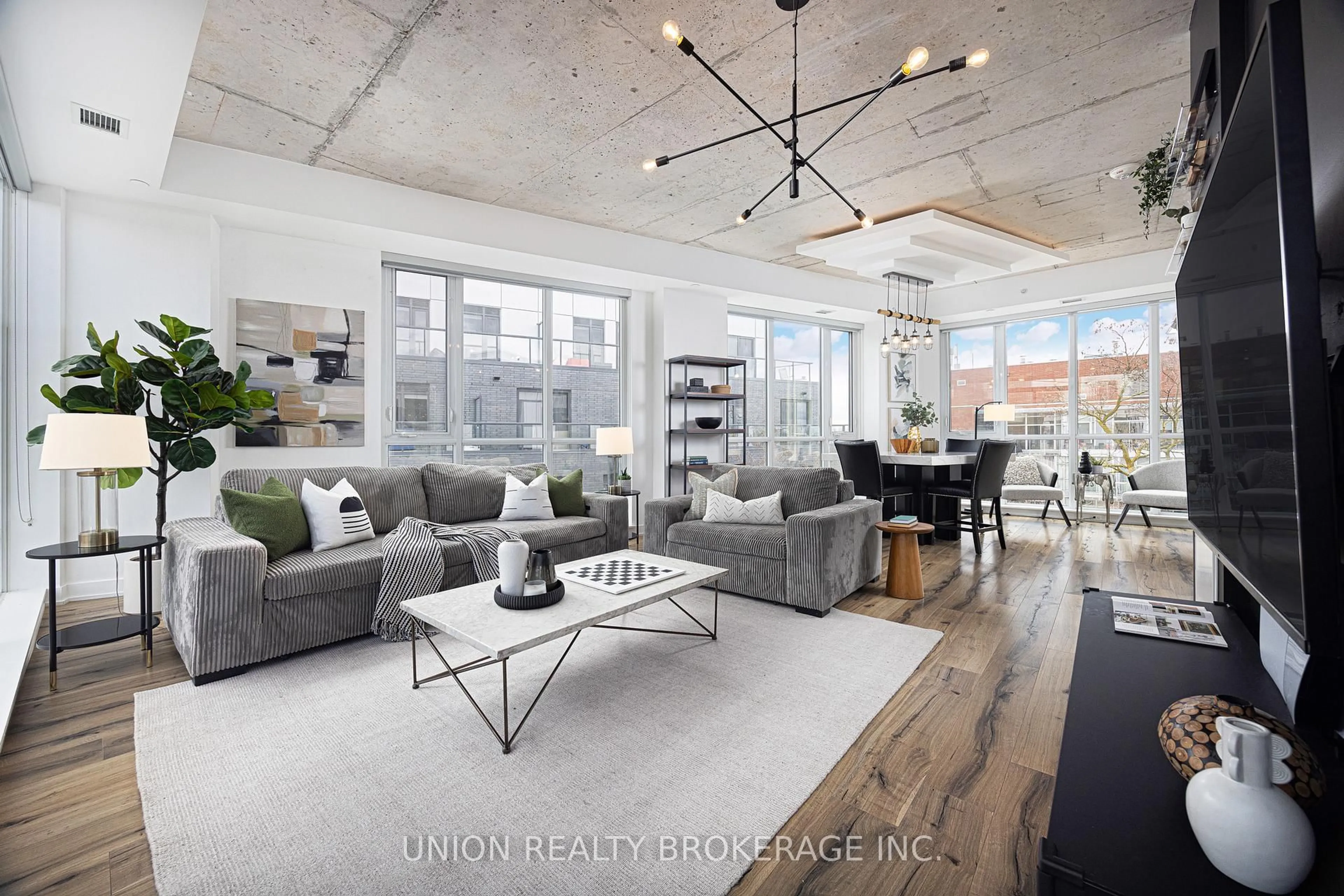Living room with furniture, cement floor for 630 Kingston Rd #PH 602, Toronto Ontario M4E 1P9