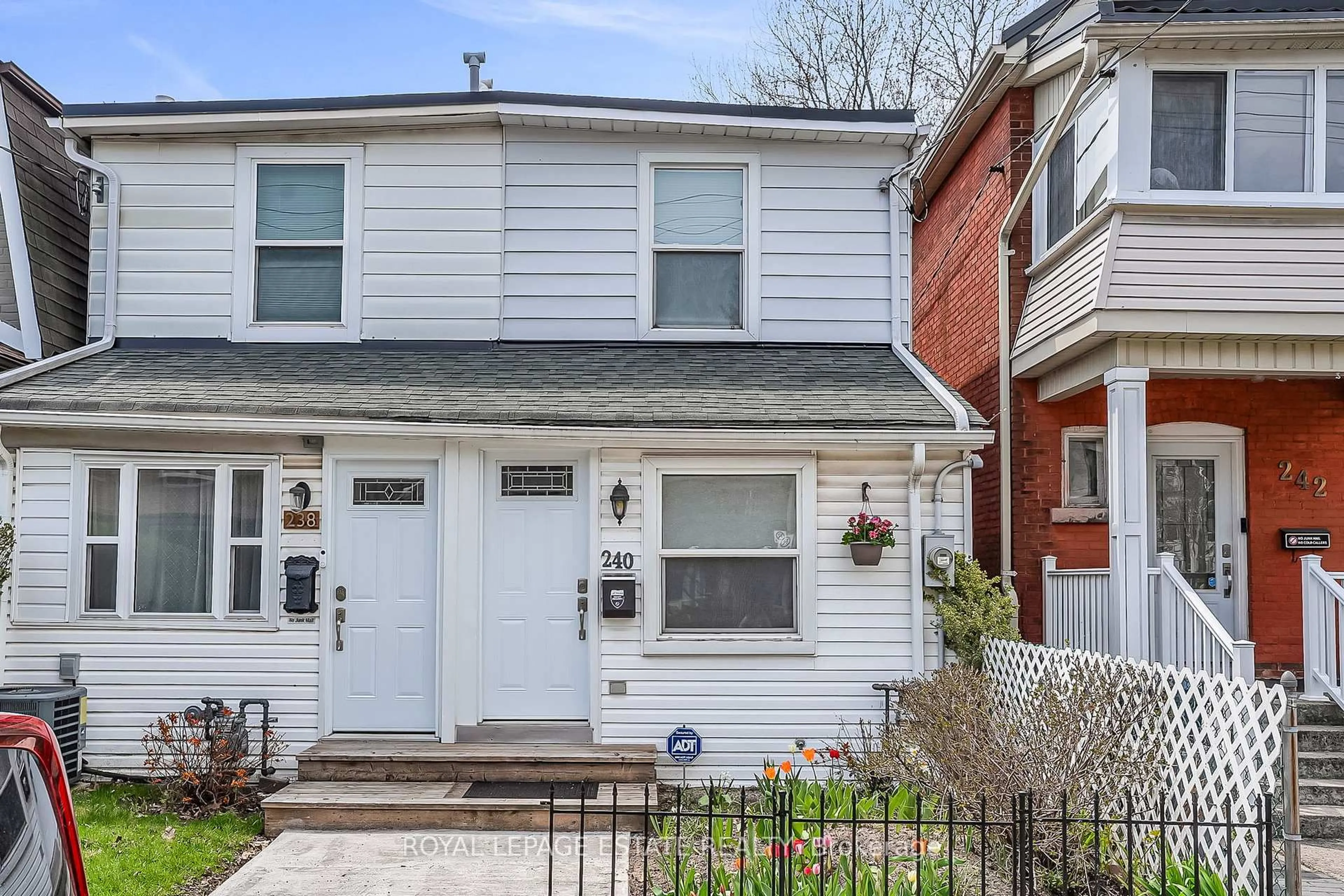 Home with brick exterior material, street for 240 Cedarvale Ave, Toronto Ontario M4C 4K2