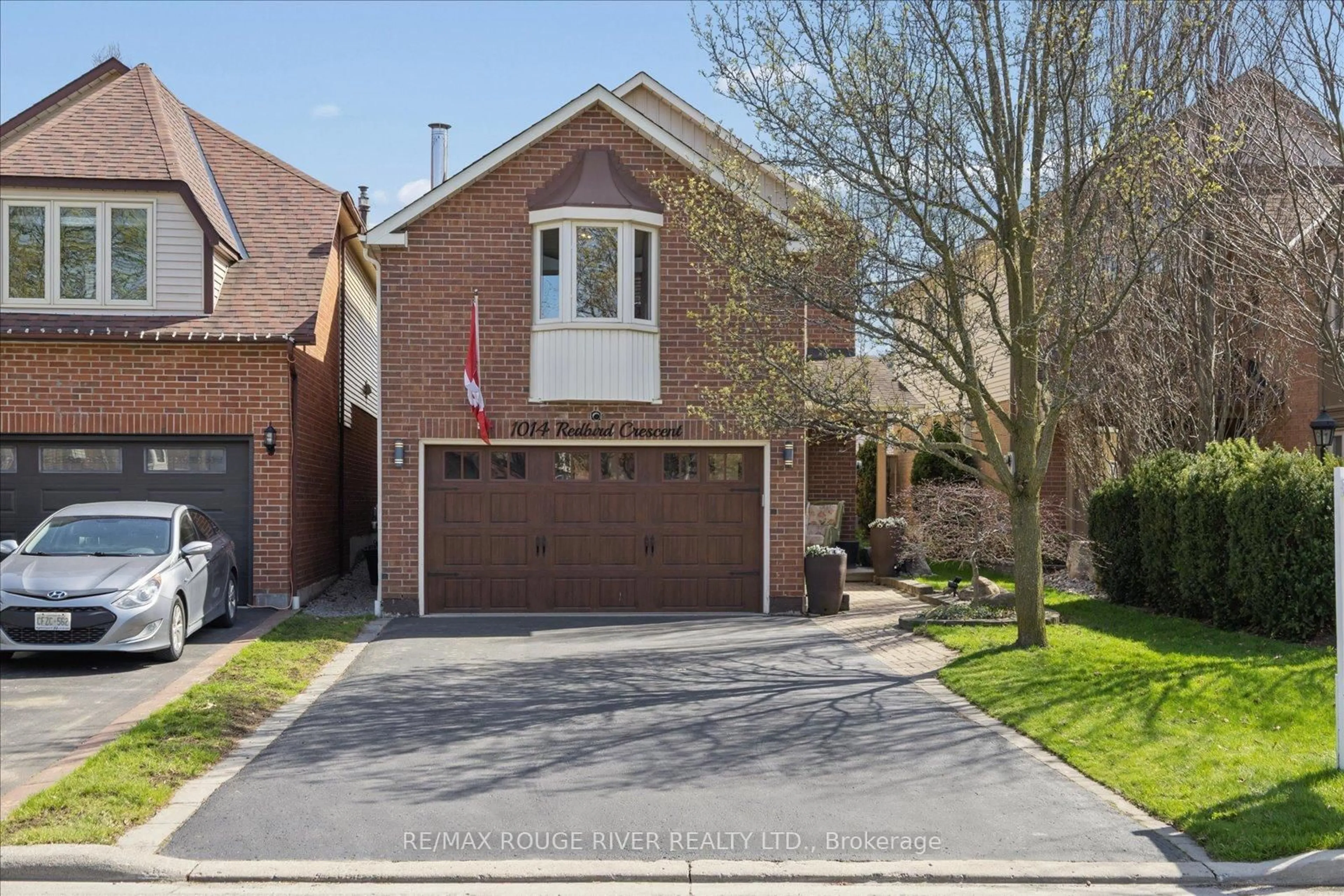 Home with brick exterior material, street for 1014 Redbird Cres, Pickering Ontario L1V 5K3