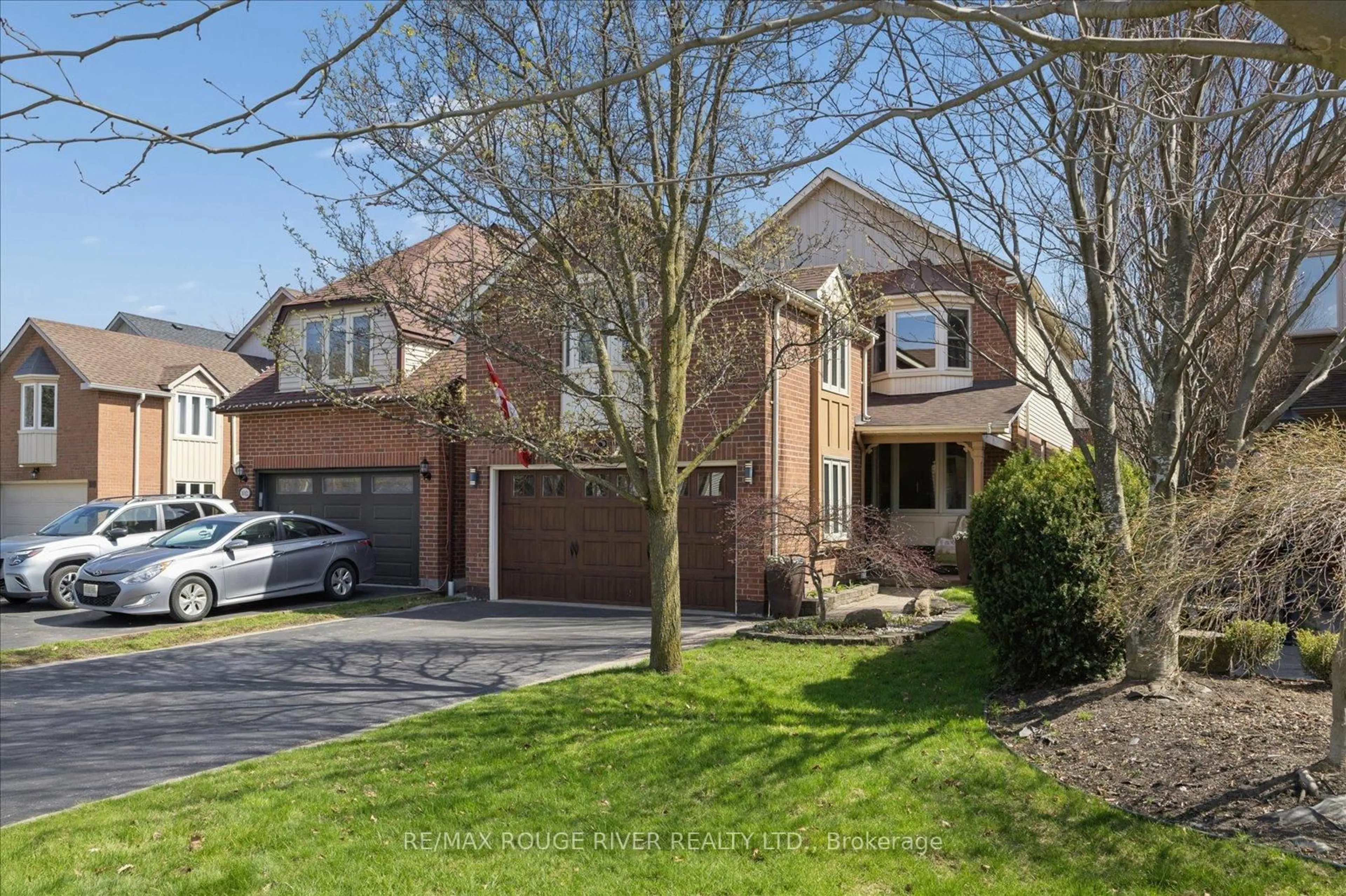 Home with brick exterior material, street for 1014 Redbird Cres, Pickering Ontario L1V 5K3