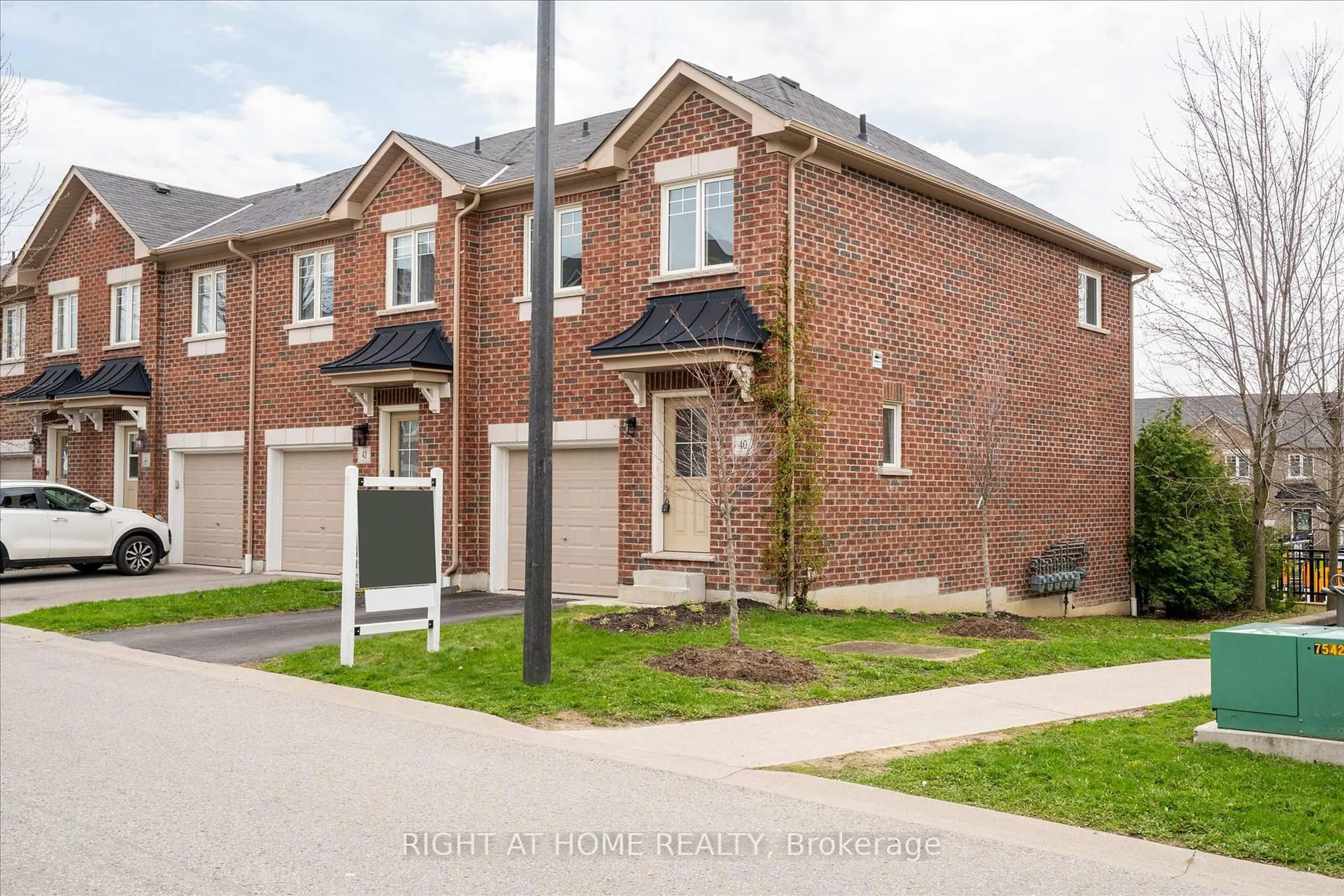 Home with brick exterior material, street for 40 Markham Tr, Clarington Ontario L1C 0S4