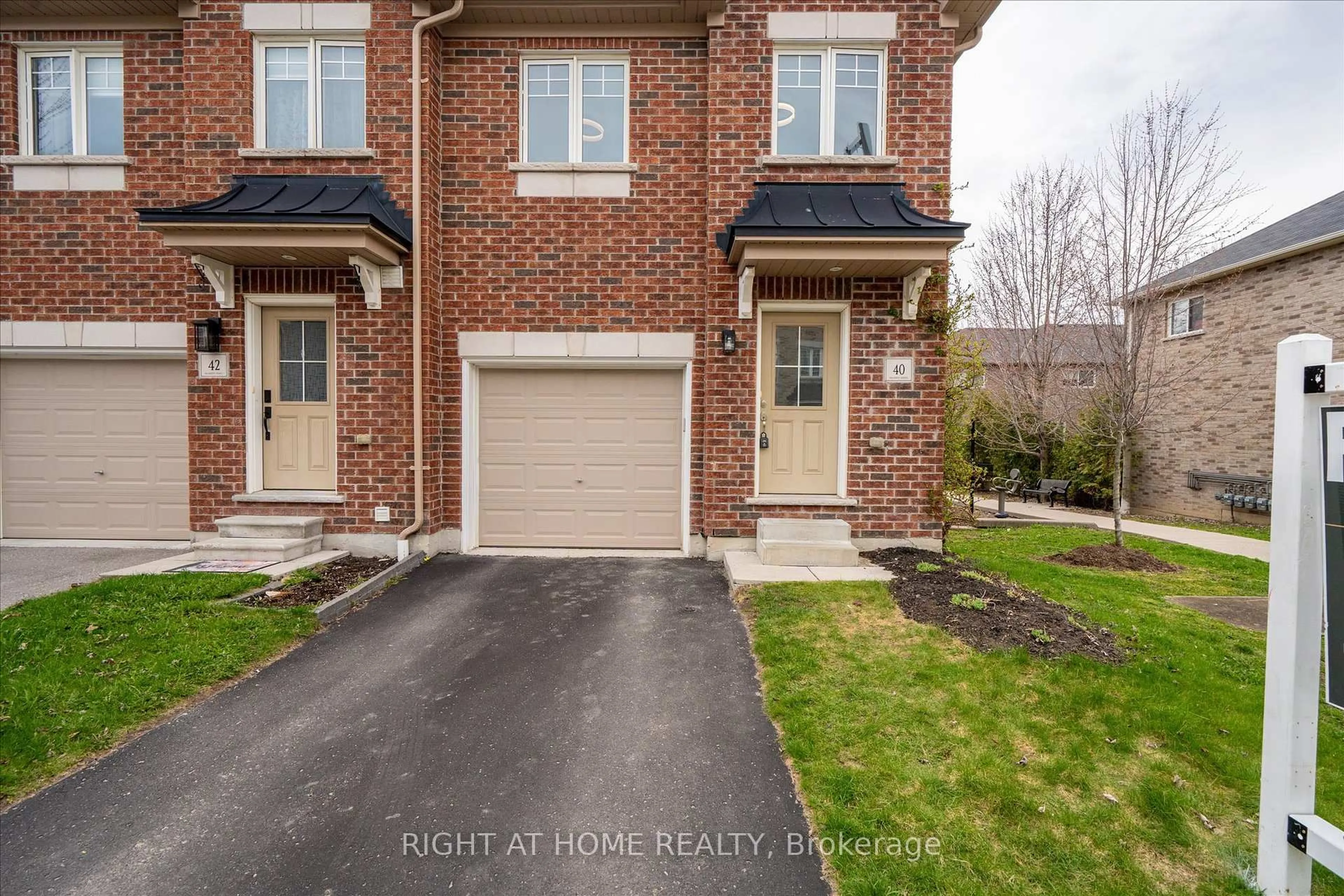 Home with brick exterior material, street for 40 Markham Tr, Clarington Ontario L1C 0S4