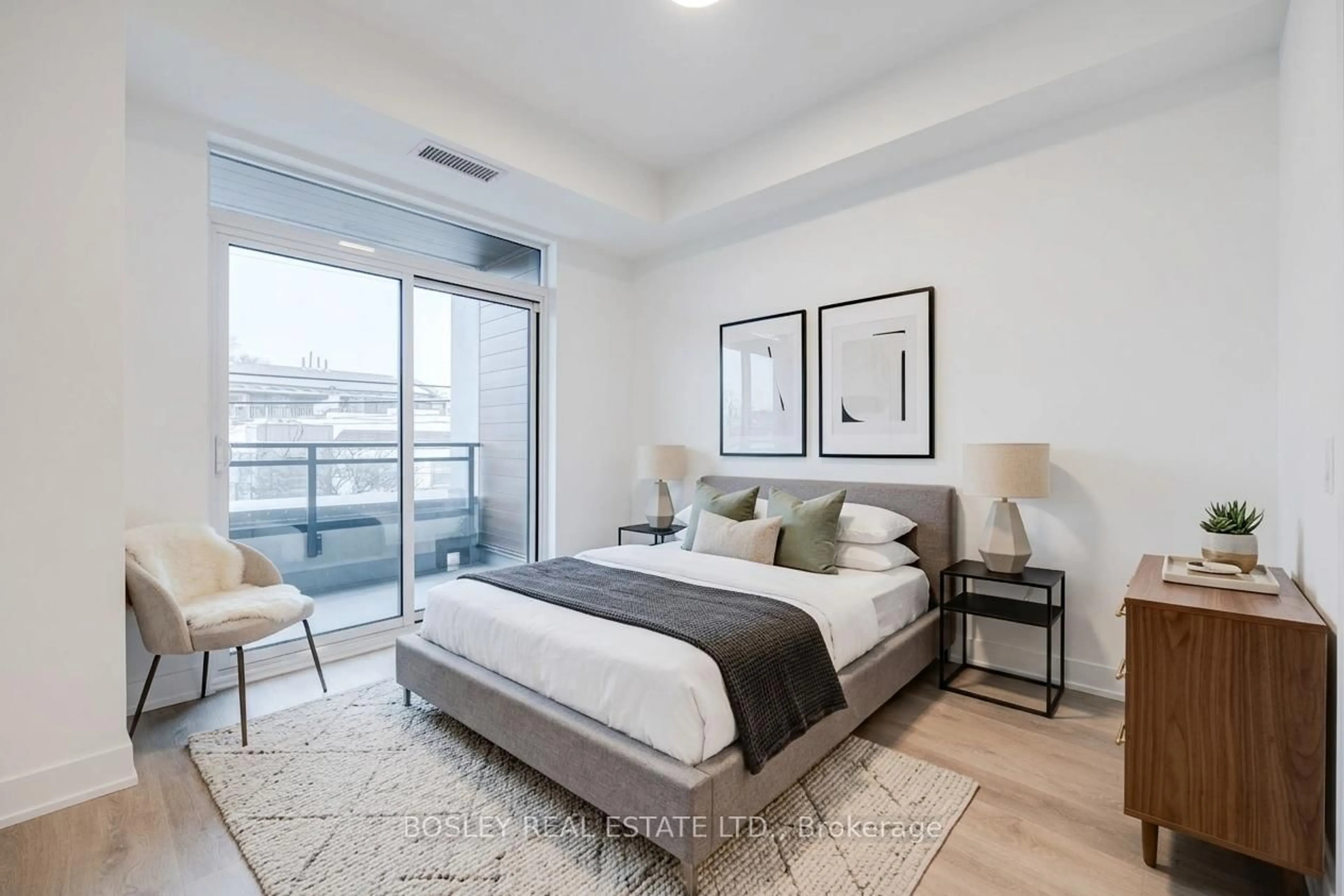 Bedroom with bed, unknown for 1285 Queen St #204, Toronto Ontario M4L 1C2