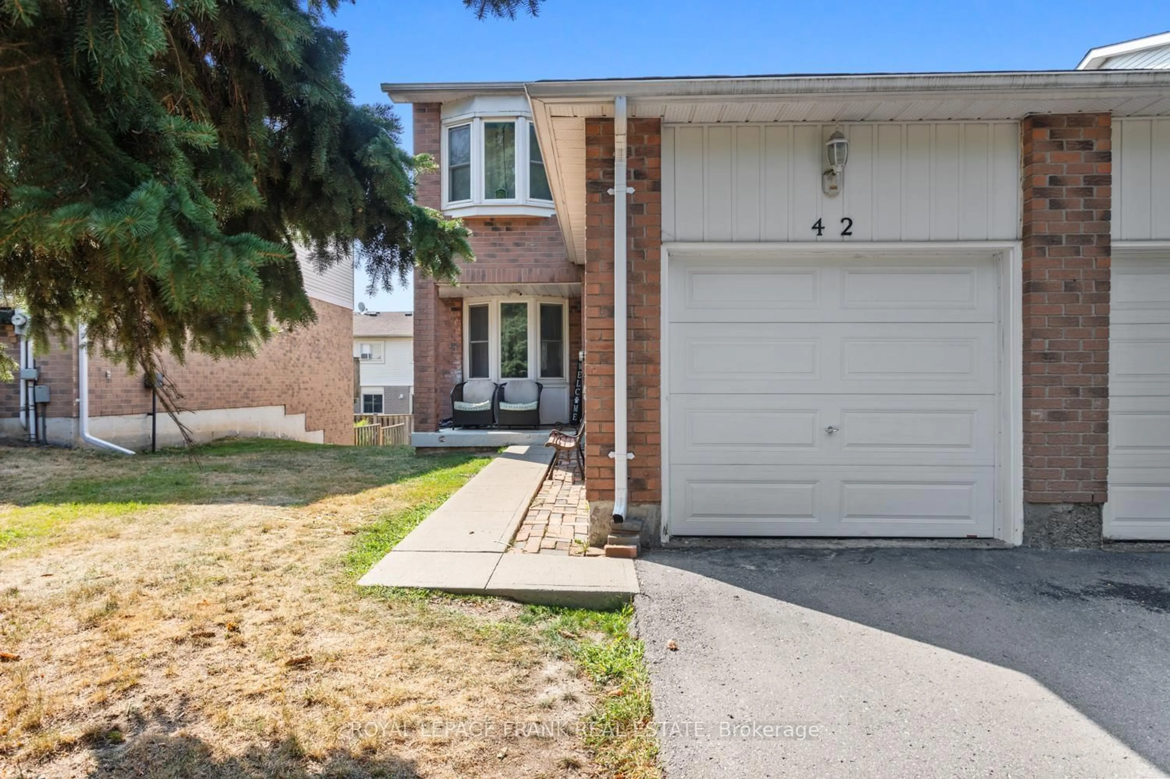 Home with vinyl exterior material, street for 700 Harmony Rd #42, Oshawa Ontario L1K 1S2