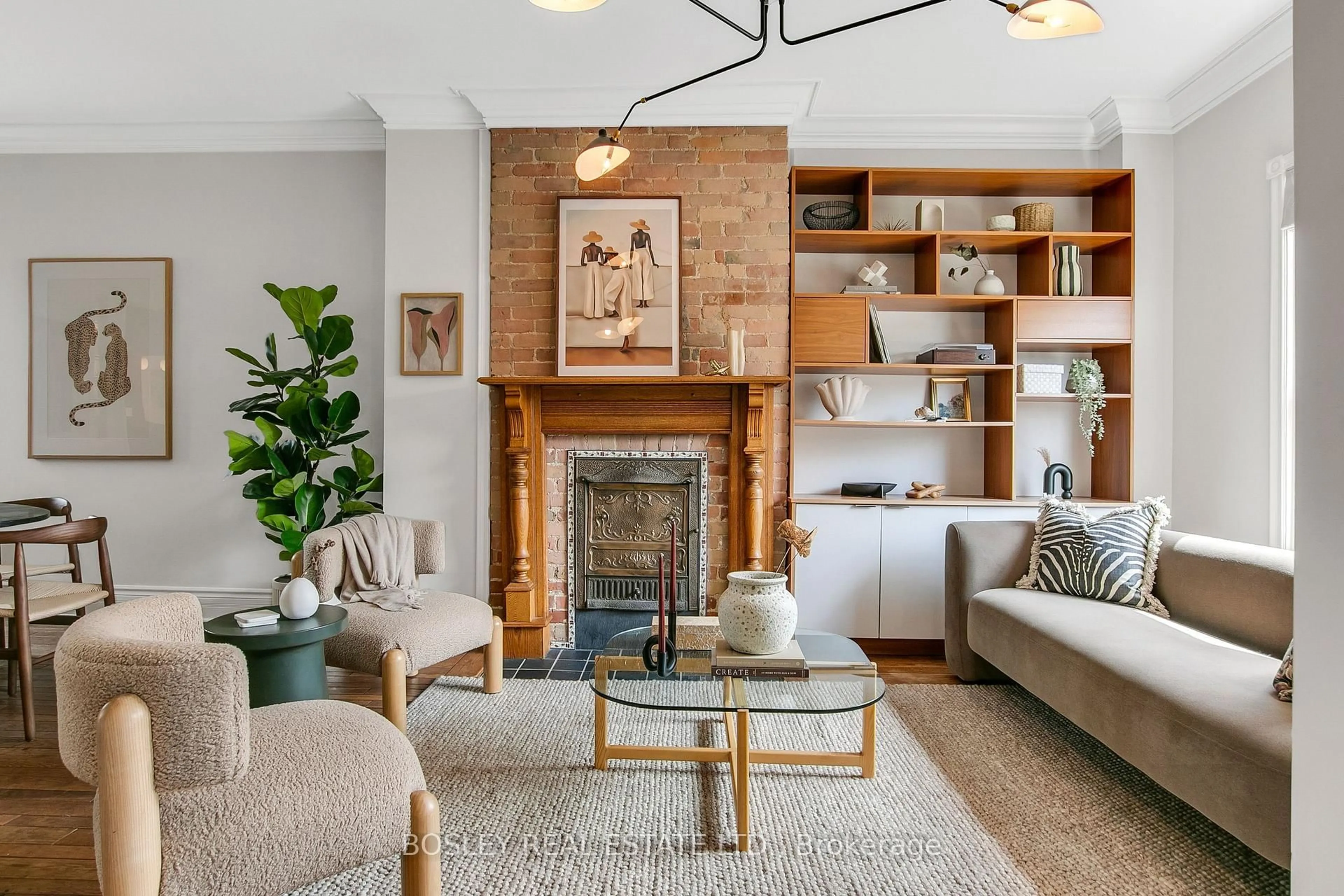 Living room with furniture, wood/laminate floor for 42 Dingwall Ave, Toronto Ontario M4J 1C3