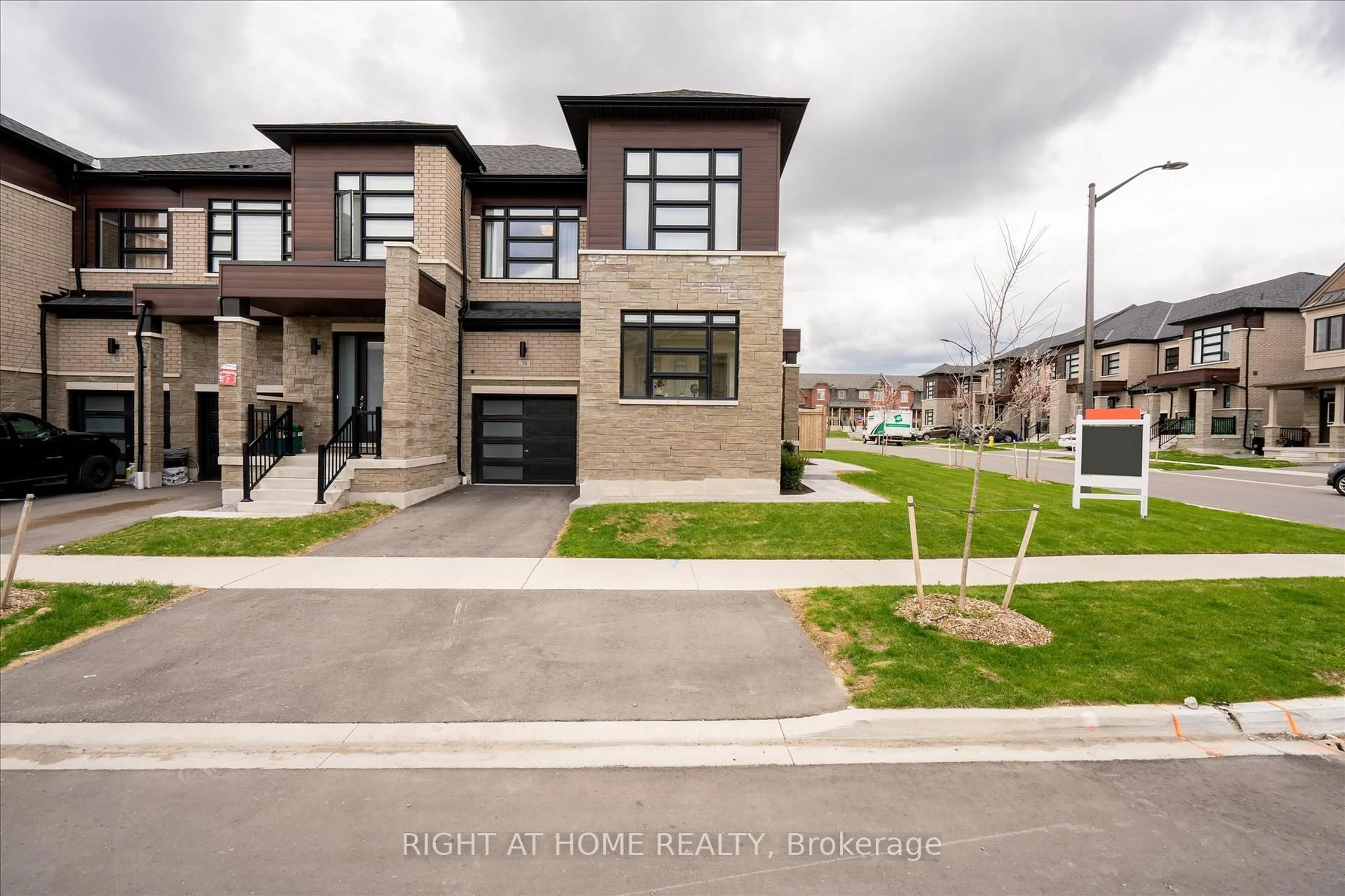 Home with brick exterior material, street for 38 Van Wart St, Whitby Ontario L1P 0P8