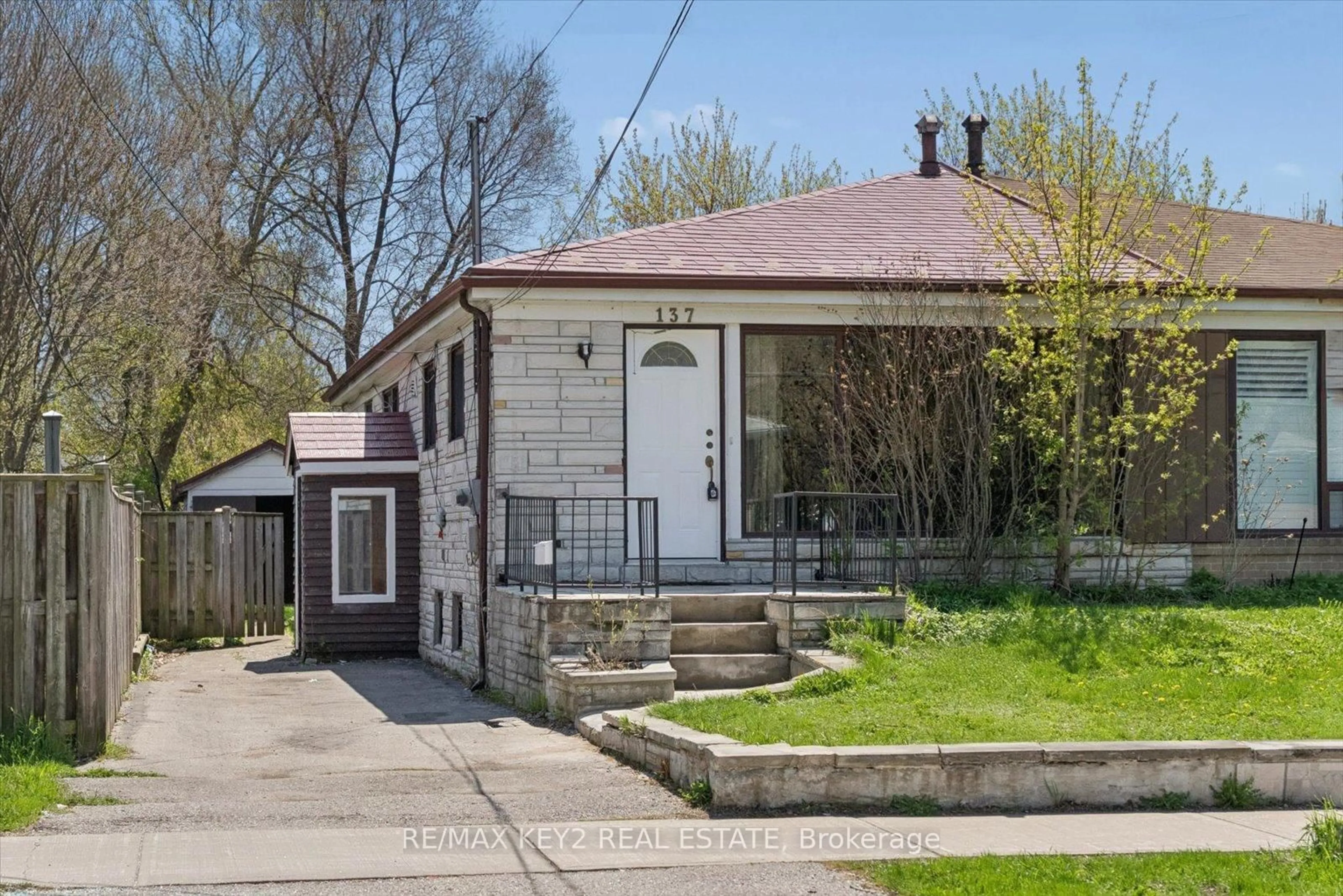 Home with brick exterior material, street for 137 Newlands Ave, Toronto Ontario M1L 1S2