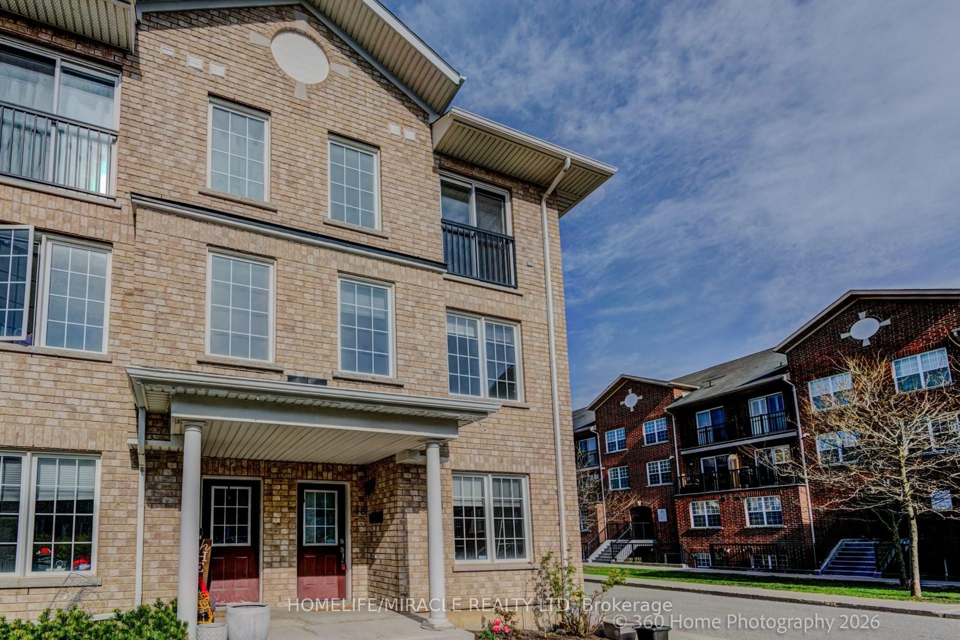 Home with brick exterior material, building for 48 Strangford Lane, Toronto Ontario M1L 0E4