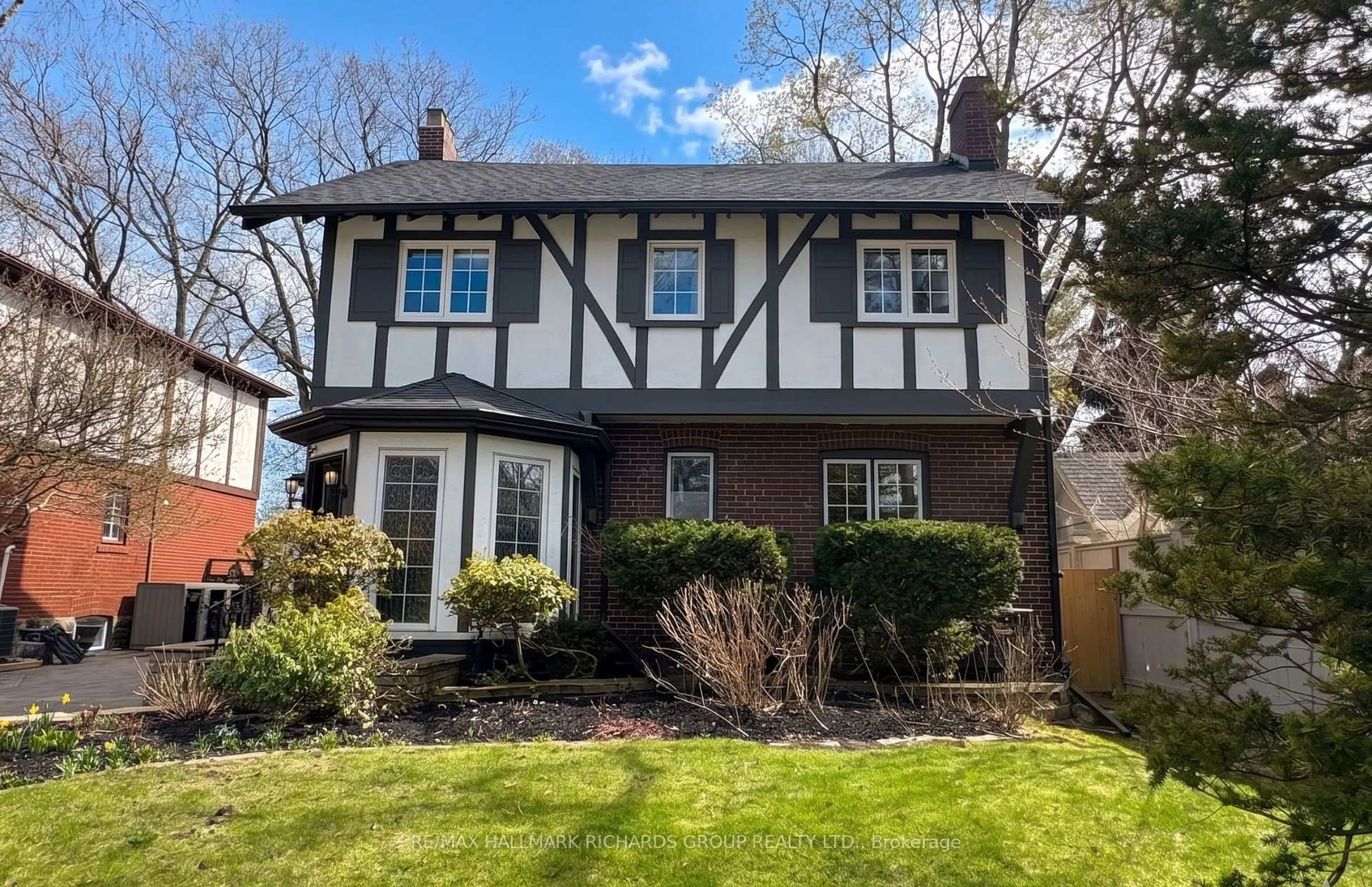 Home with vinyl exterior material, street for 27 Bracken Ave, Toronto Ontario M4E 1N4