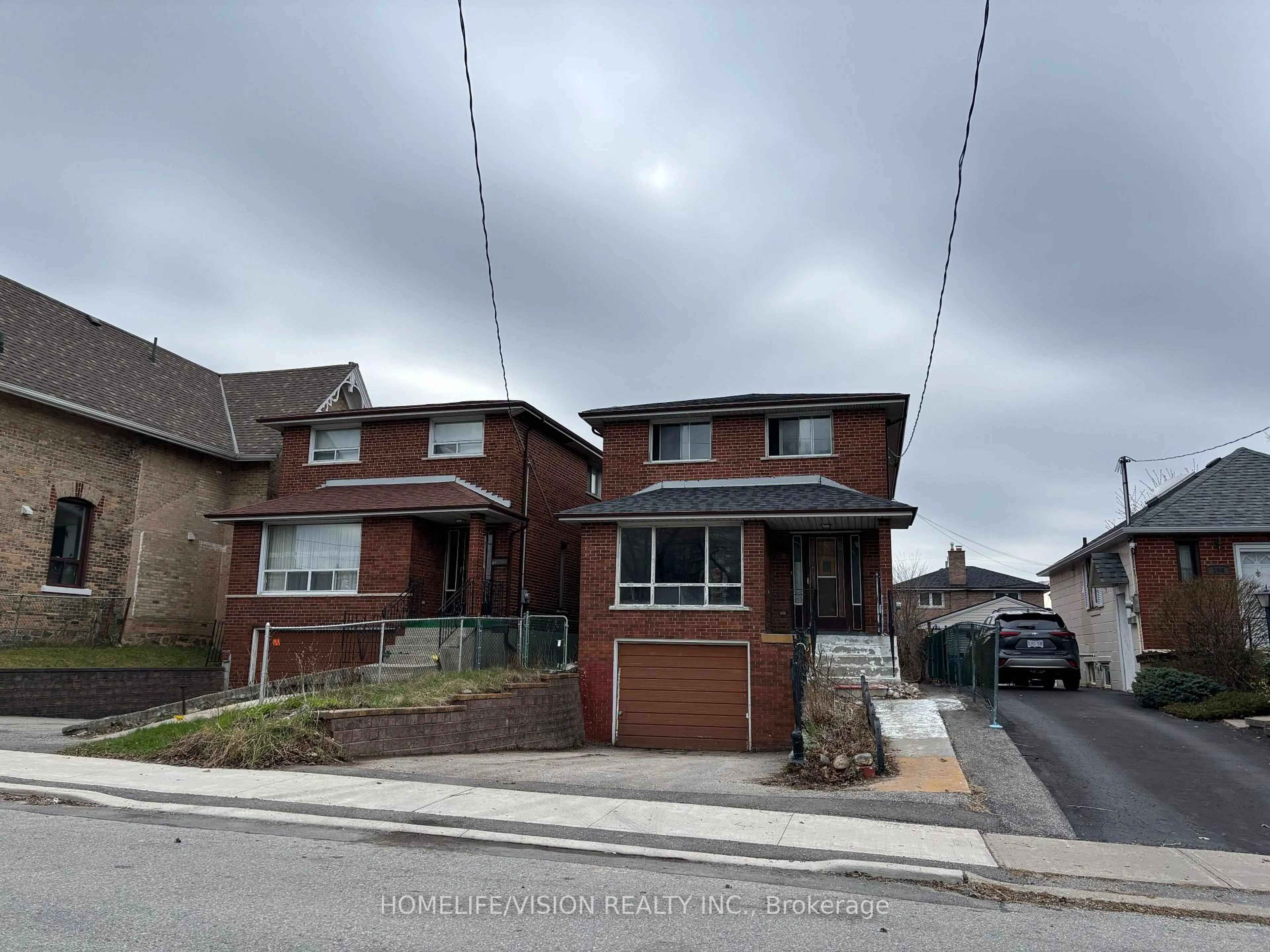 Home with brick exterior material, street for 102 Magnolia Ave, Toronto Ontario M1K 3K6
