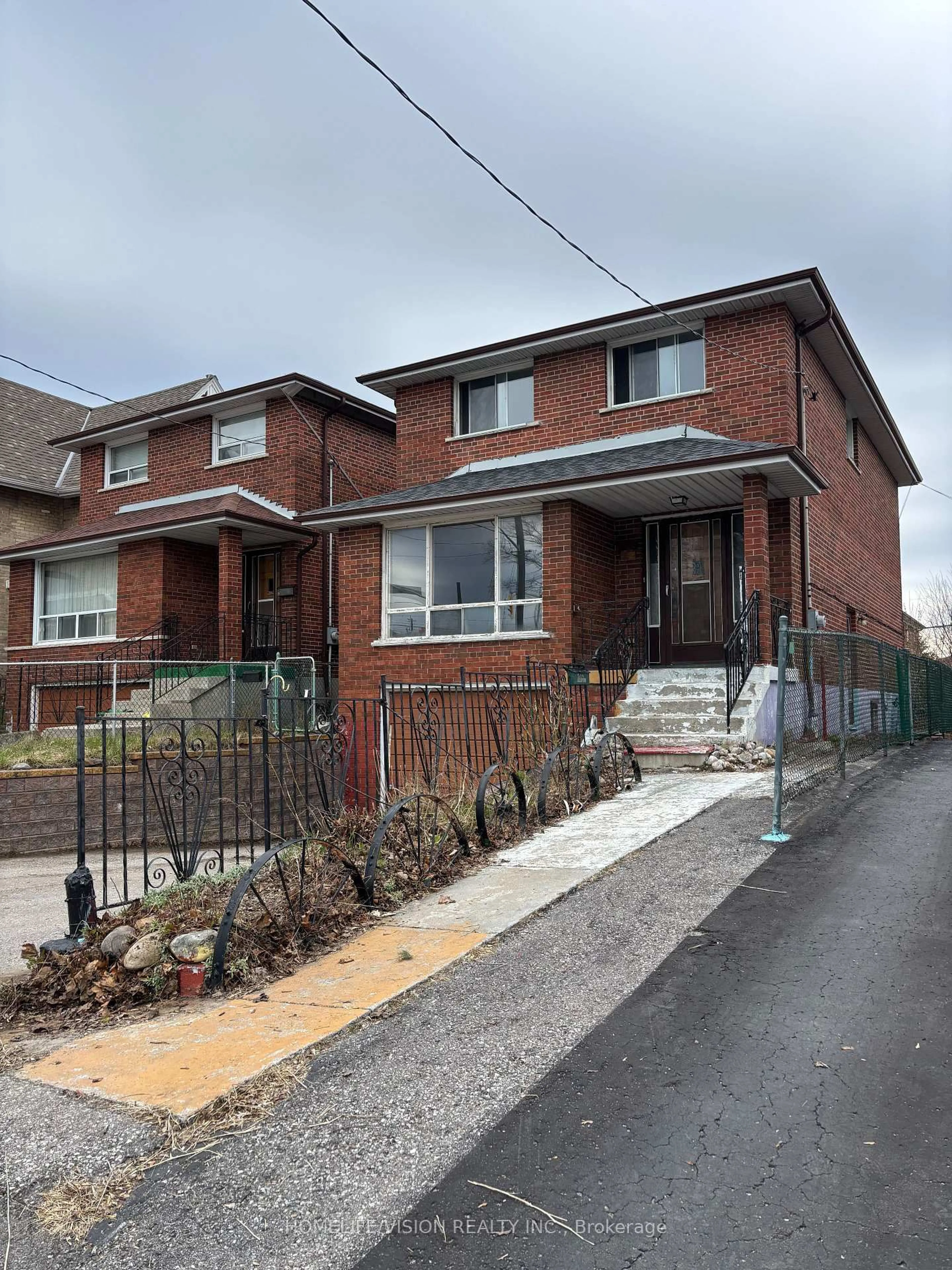 Home with brick exterior material, street for 102 Magnolia Ave, Toronto Ontario M1K 3K6