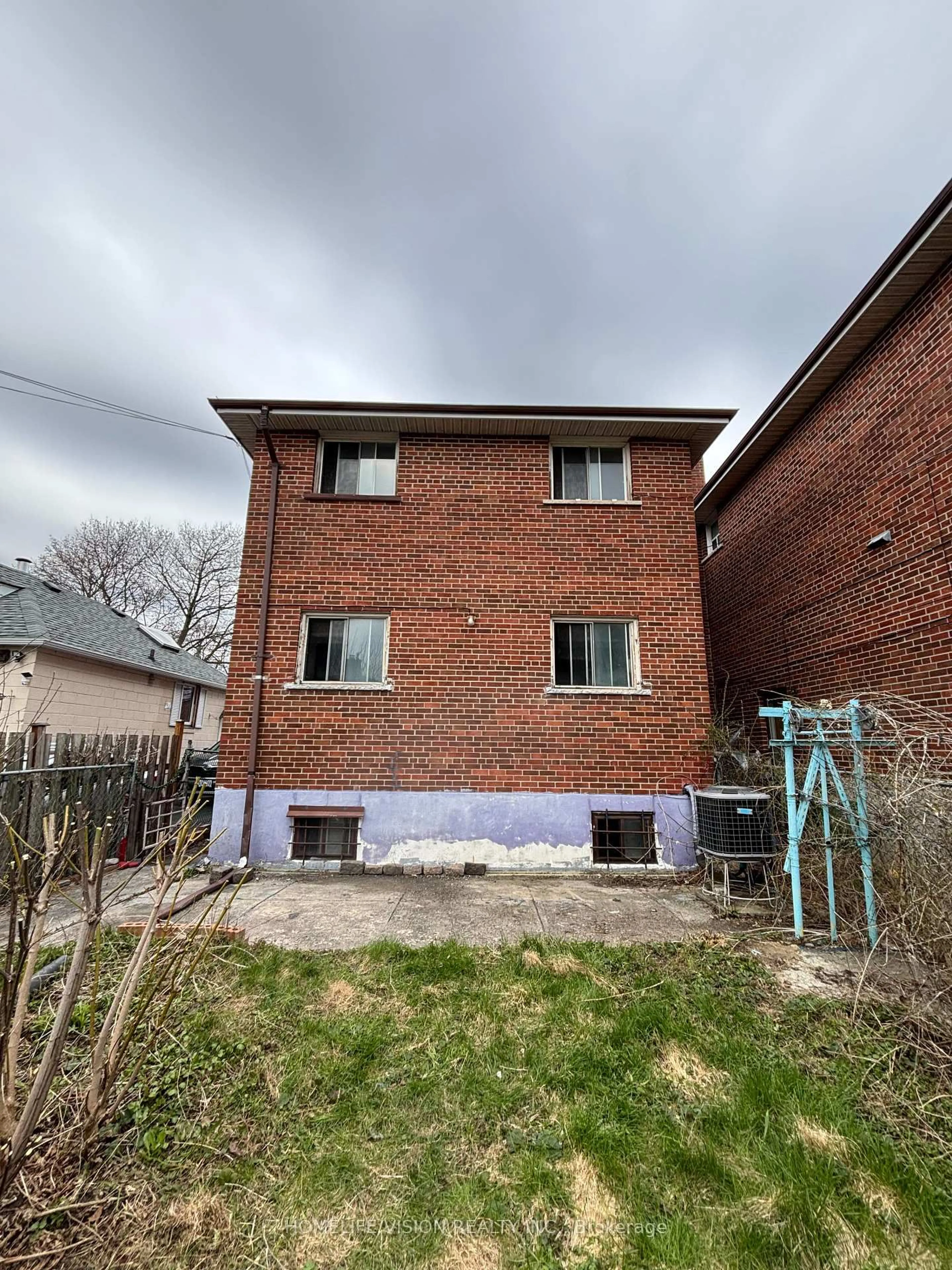 Home with brick exterior material, building for 102 Magnolia Ave, Toronto Ontario M1K 3K6