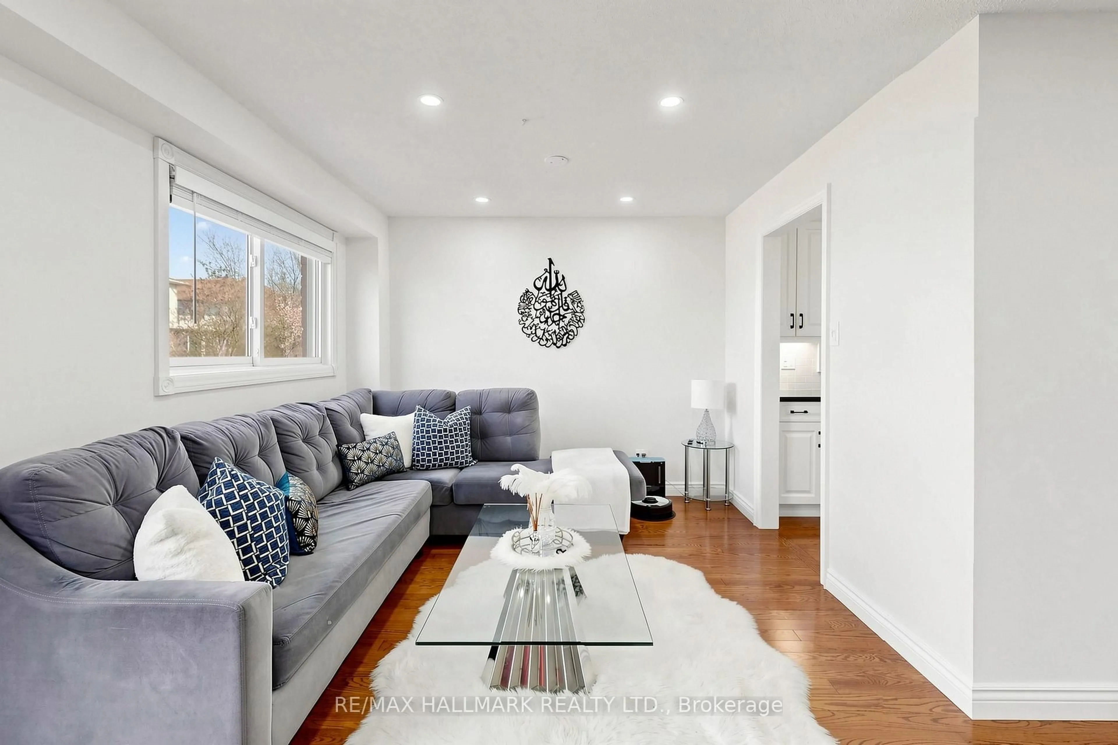 Living room with furniture, wood/laminate floor for 173 Rands Rd, Ajax Ontario L1S 3Z9