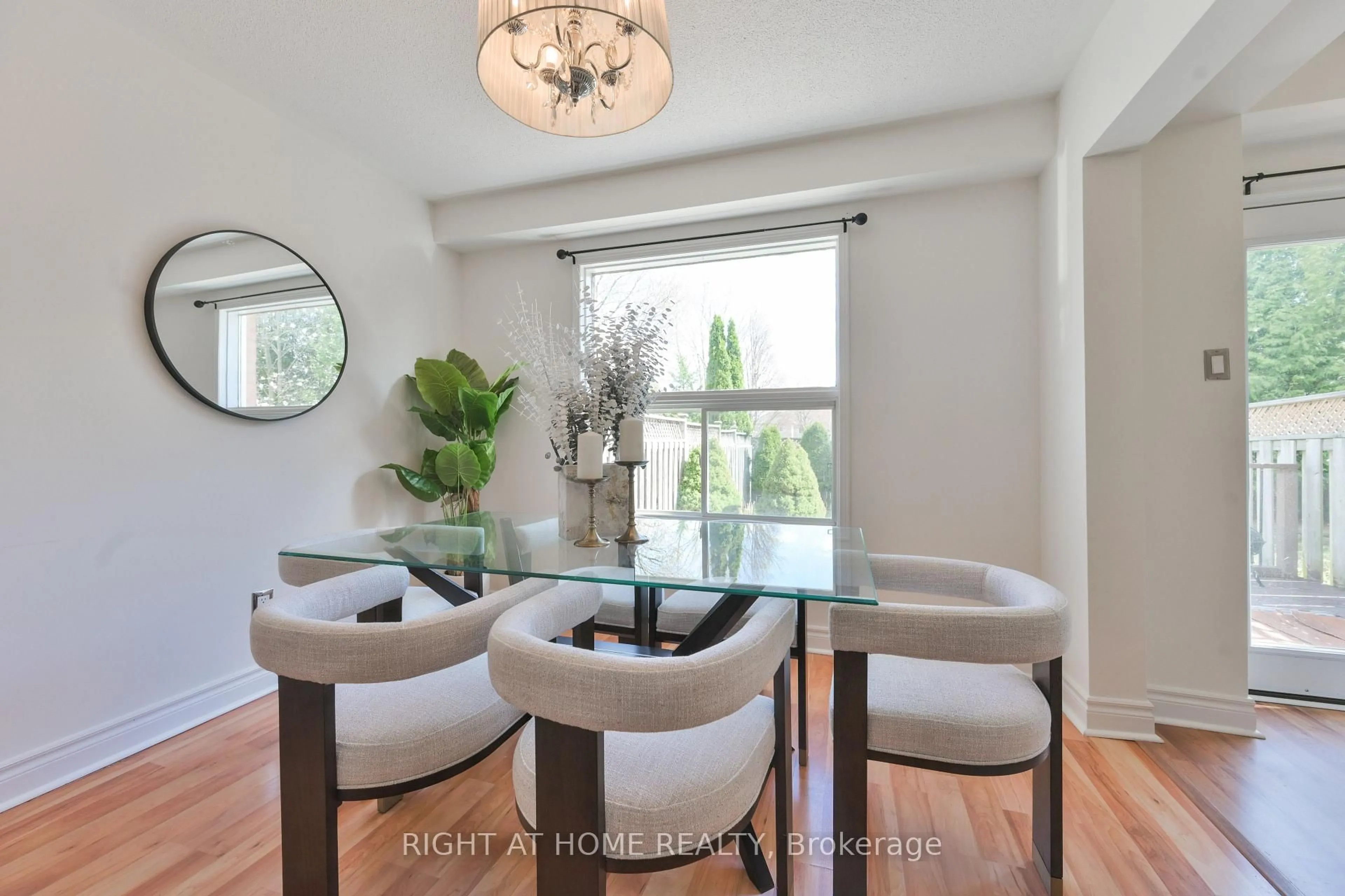 Dining room, wood/laminate floor for 112 Creekwood Cres, Whitby Ontario L1R 2K4