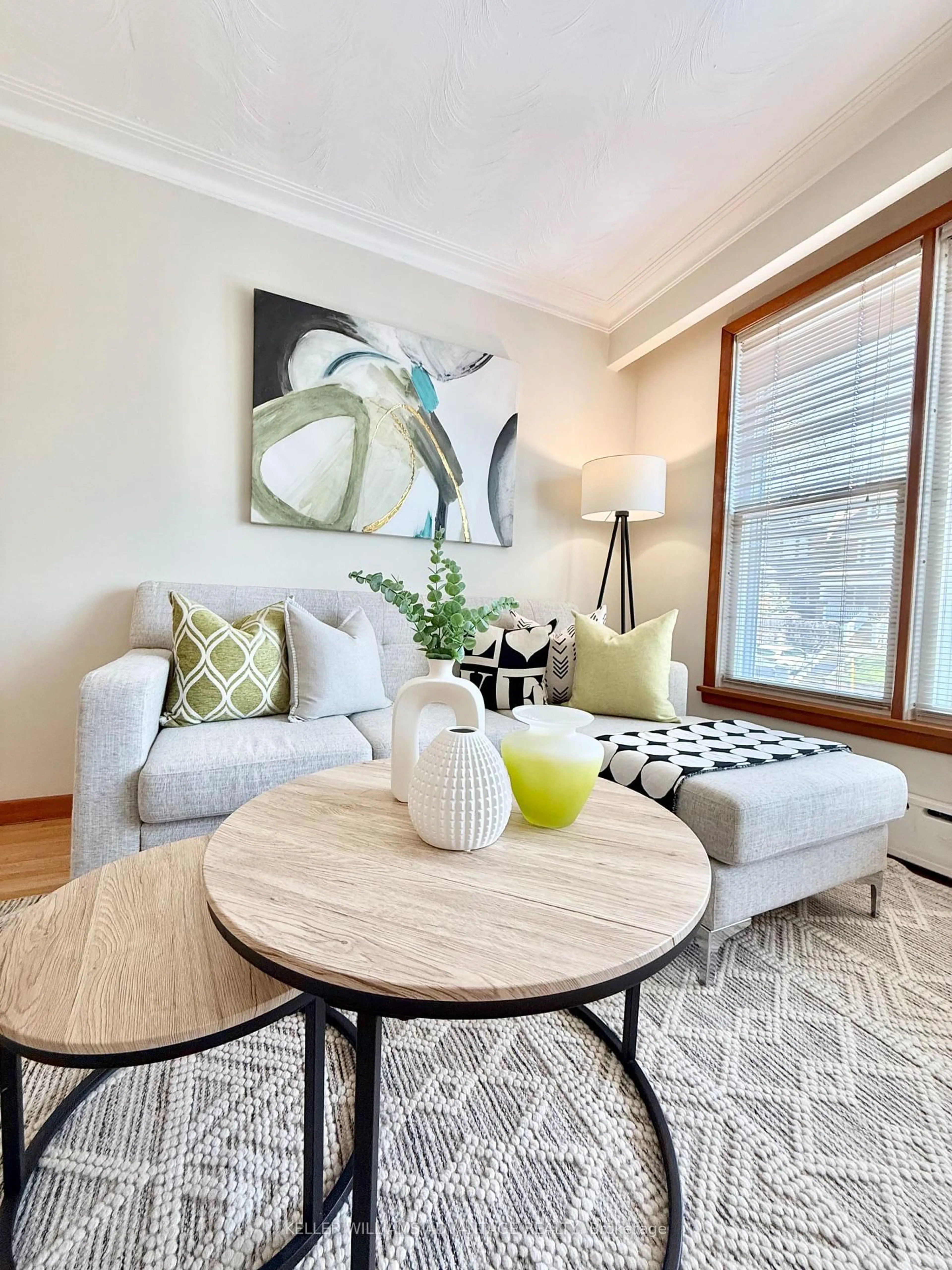 Living room with furniture, wood/laminate floor for 118 Silver Birch Ave, Toronto Ontario M4E 3L4