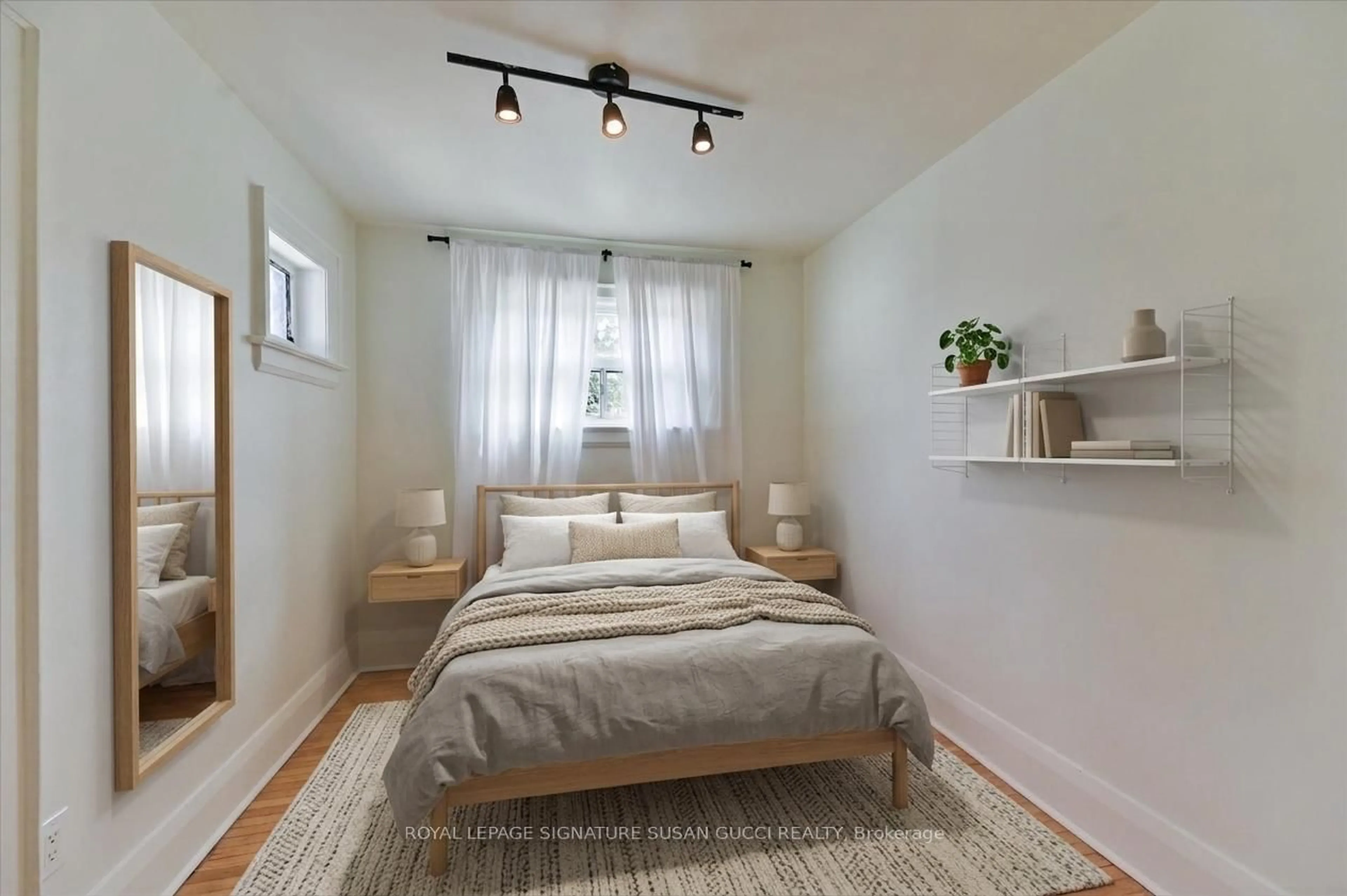 Bedroom with bed, unknown for 669 Greenwood Ave, Toronto Ontario M4J 4B3