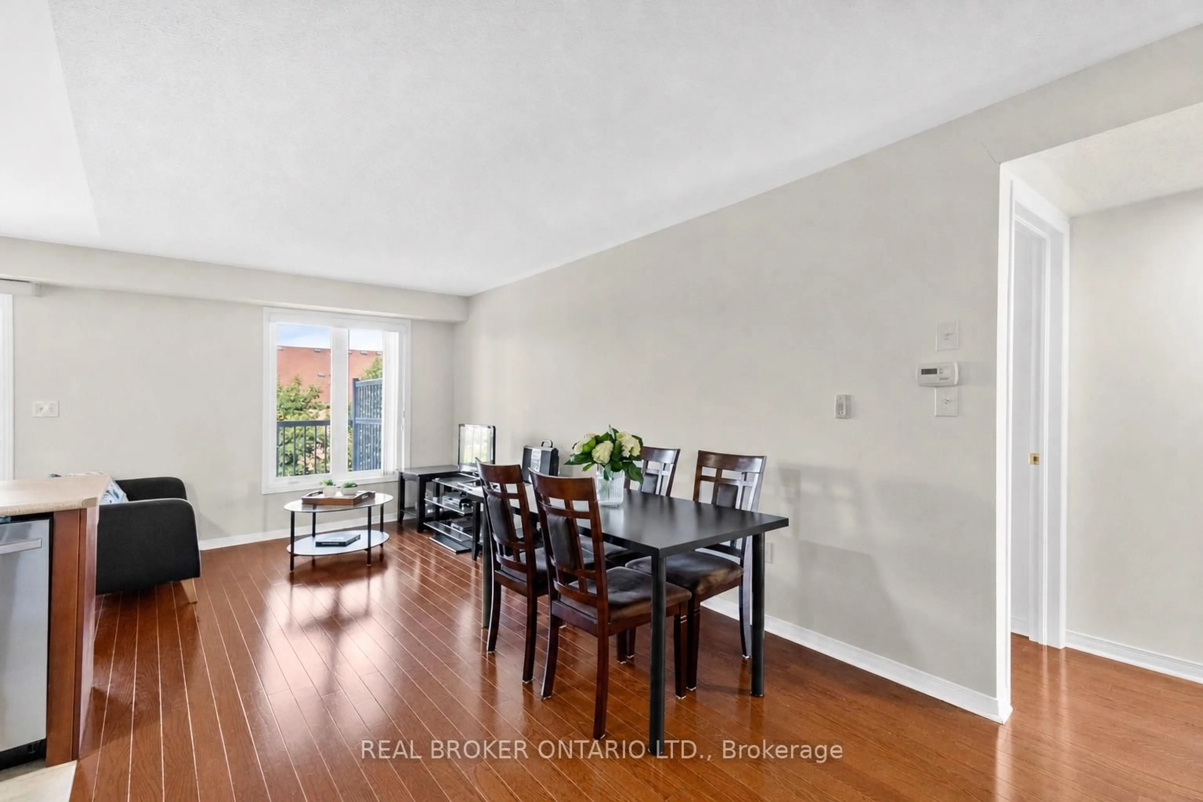 Dining room, wood/laminate floor for 649E Warden Ave #27, Toronto Ontario M1L 0E7