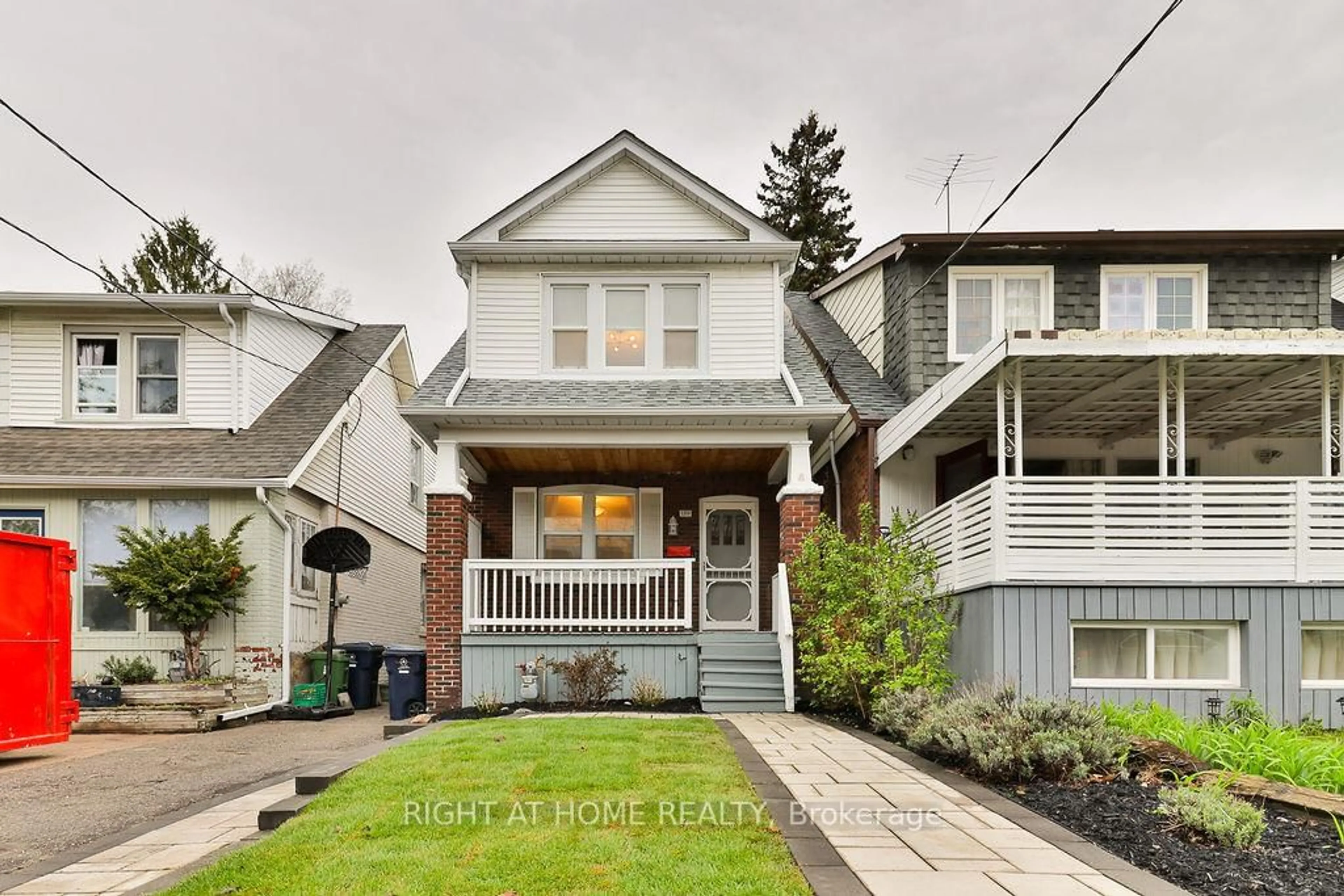 Home with brick exterior material, street for 130 Springdale Blvd, Toronto Ontario M4J 1W9