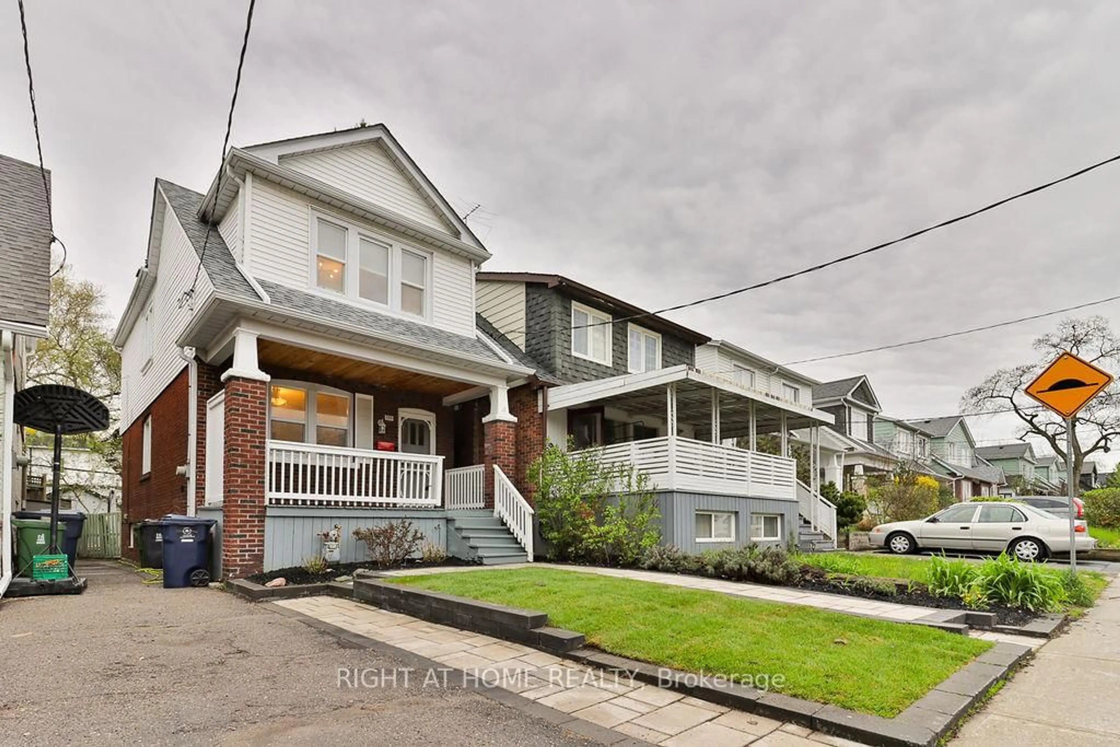 Home with brick exterior material, street for 130 Springdale Blvd, Toronto Ontario M4J 1W9