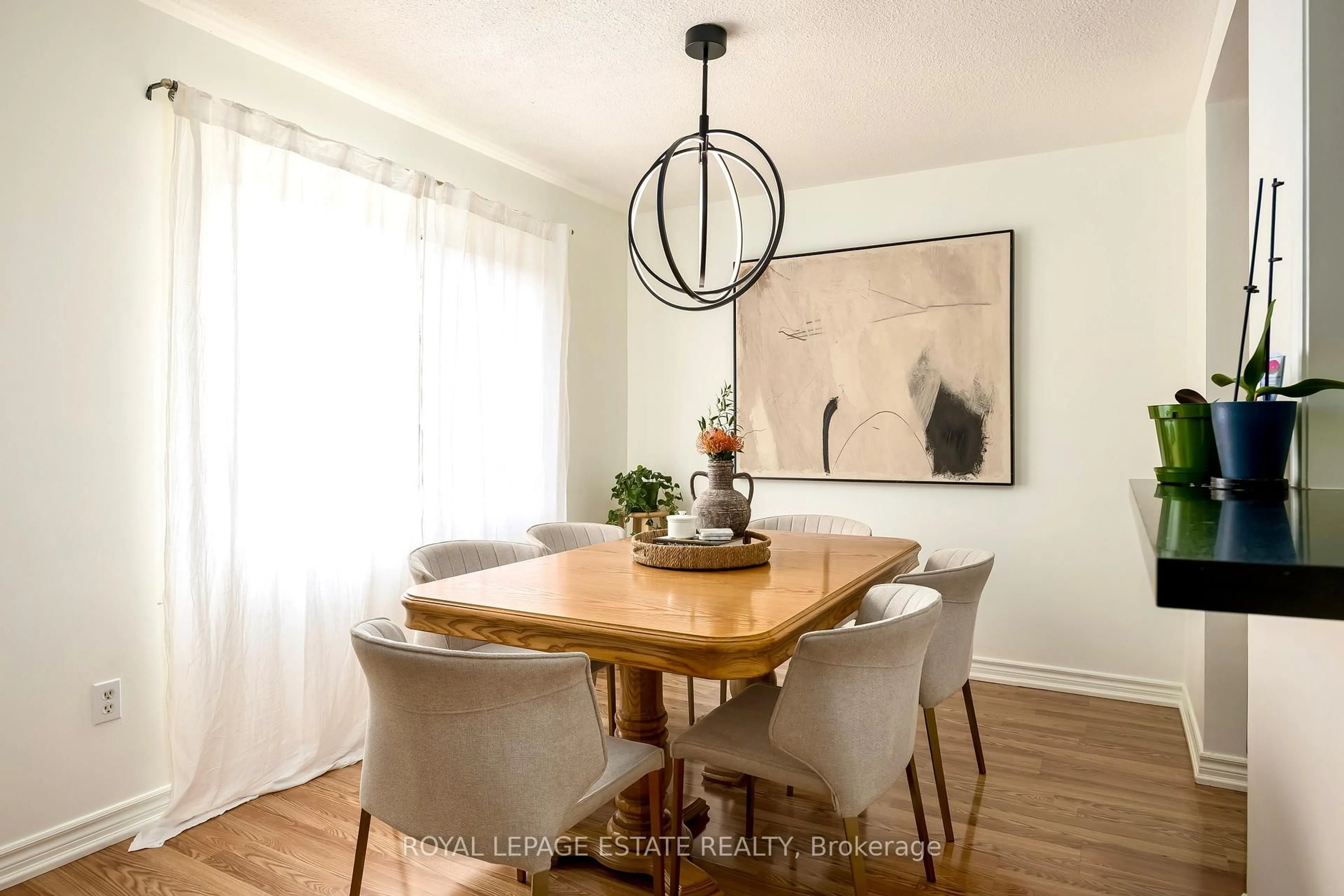 Dining room, wood/laminate floor for 270 Timberbank Blvd #78, Toronto Ontario M1W 2M1