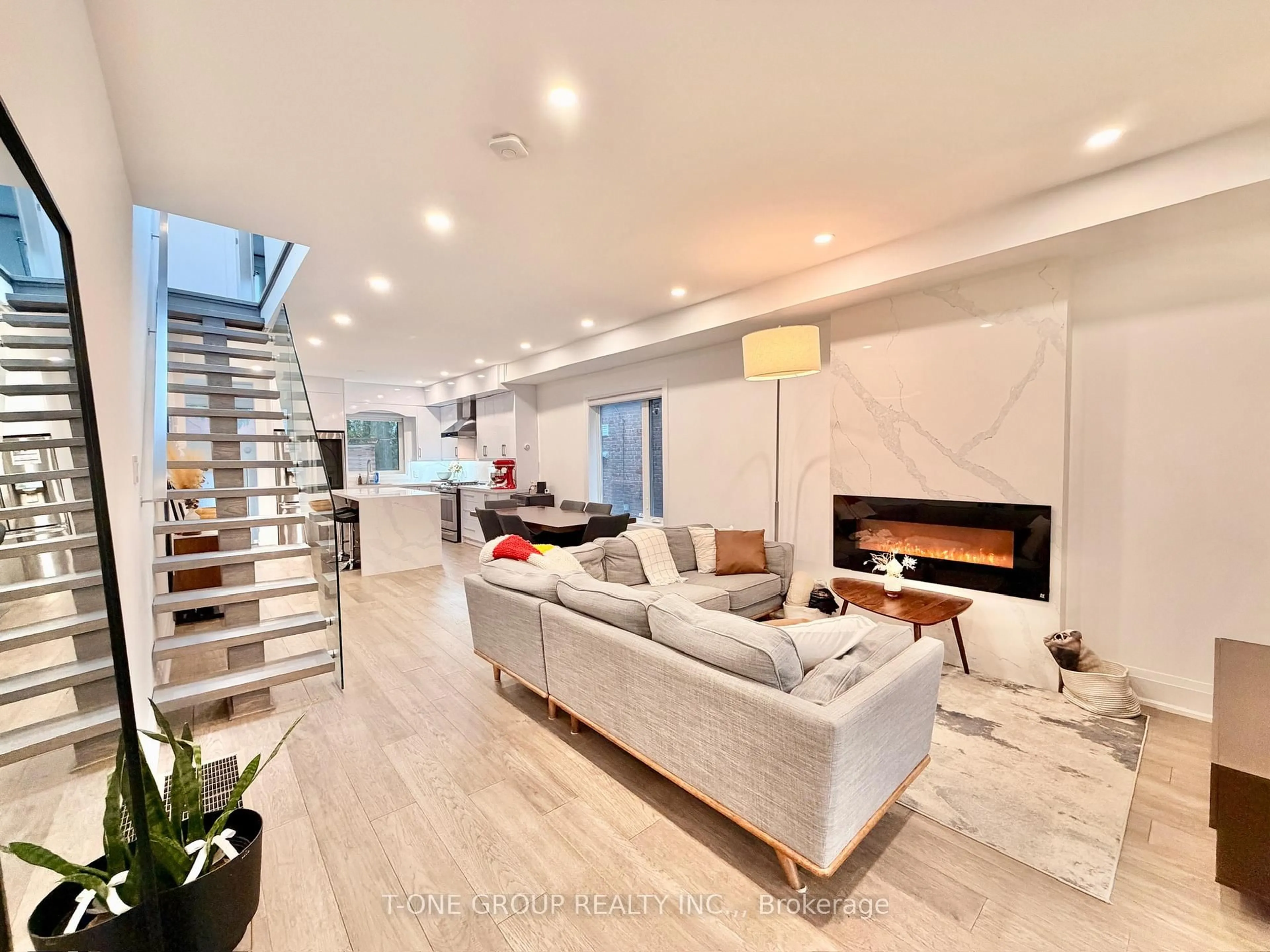 Living room with furniture, unknown for 173 Drayton Ave, Toronto Ontario M4C 3M1