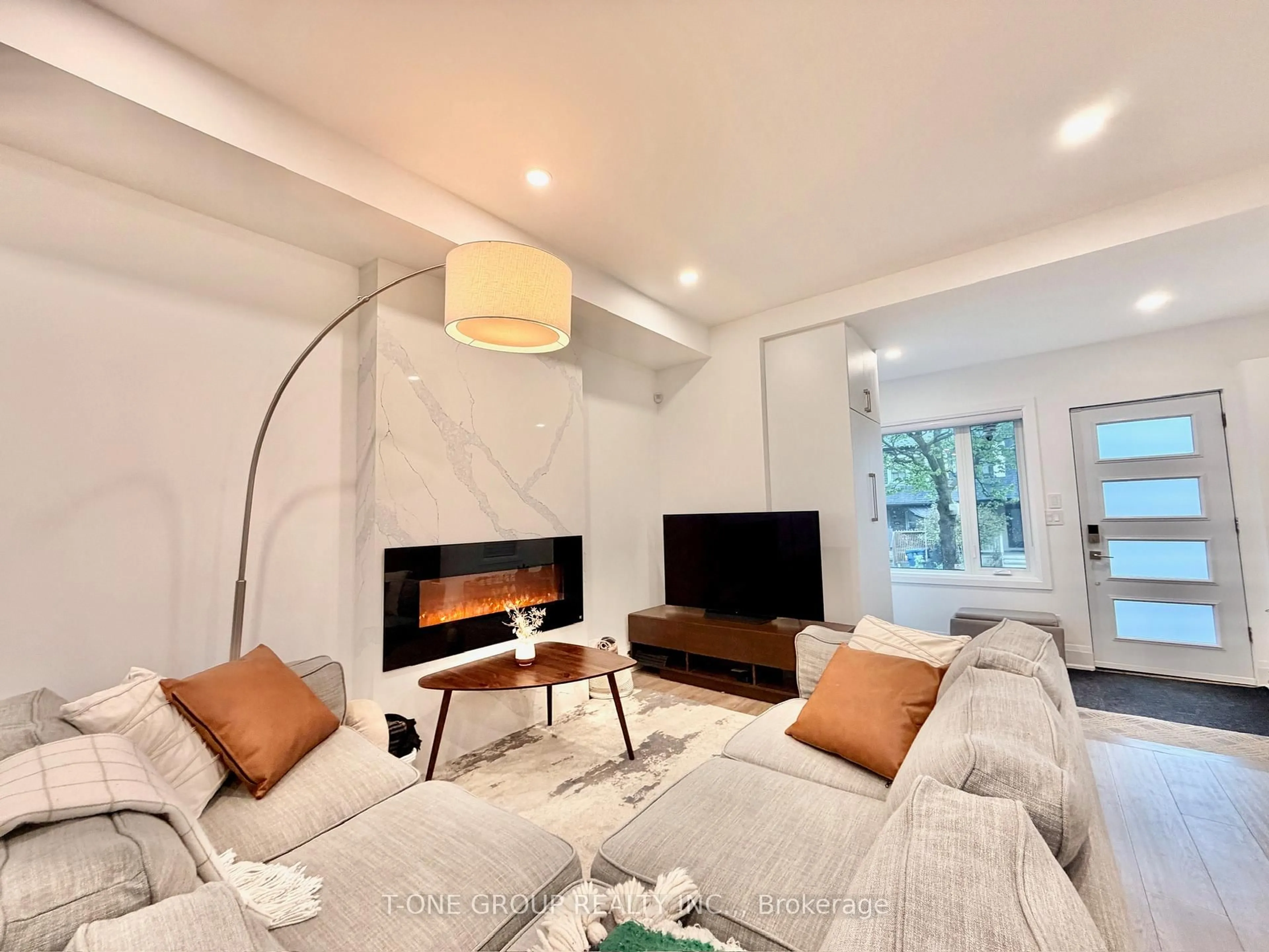 Living room with furniture, unknown for 173 Drayton Ave, Toronto Ontario M4C 3M1