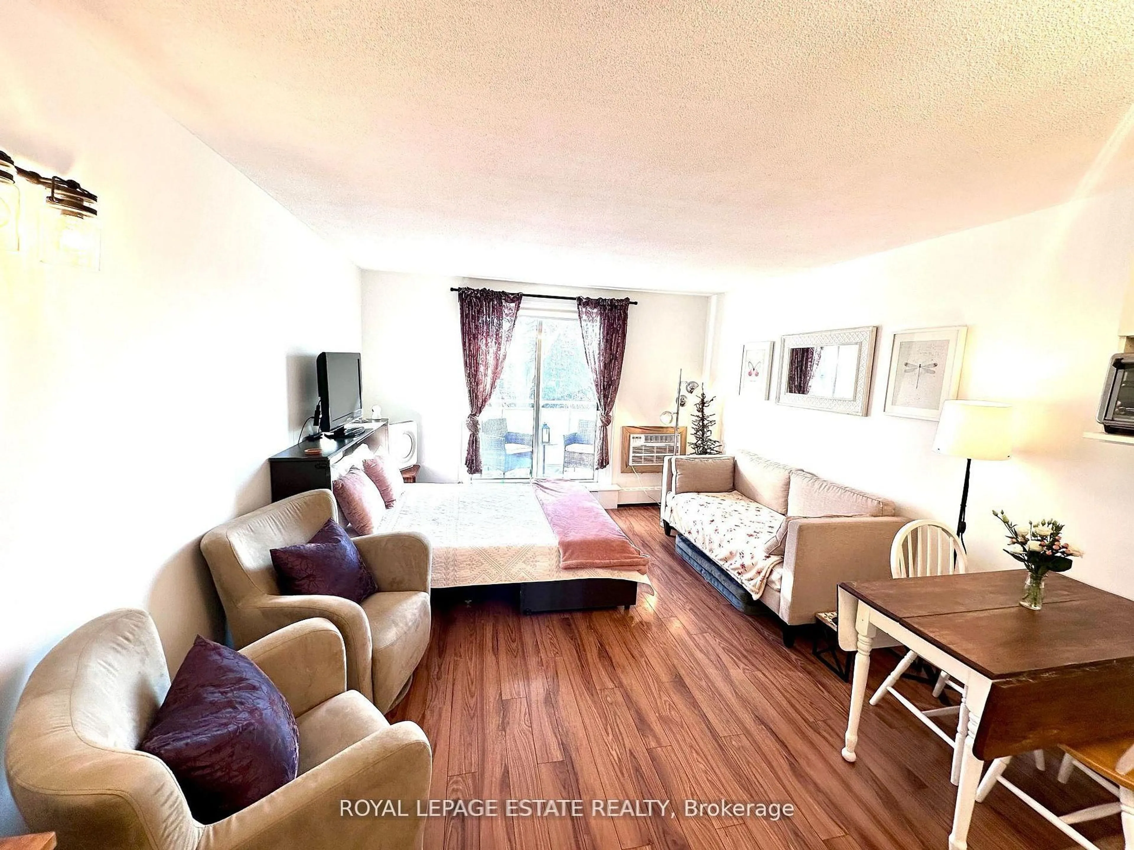 Living room with furniture, unknown for 123 Woodbine Ave #309, Toronto Ontario M4L 3V8