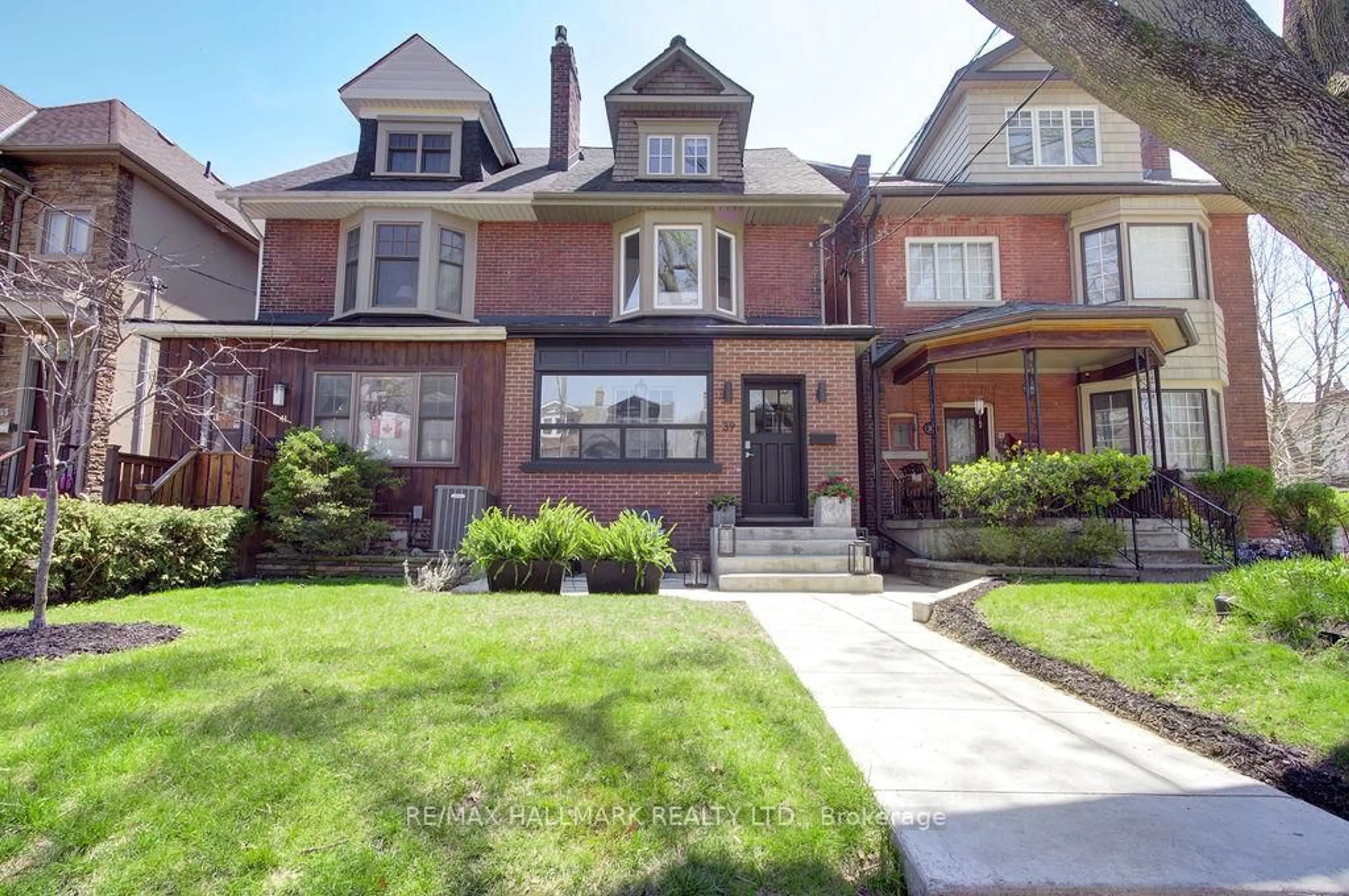 Home with brick exterior material, street for 39 Dixon Ave, Toronto Ontario M4L 1N4