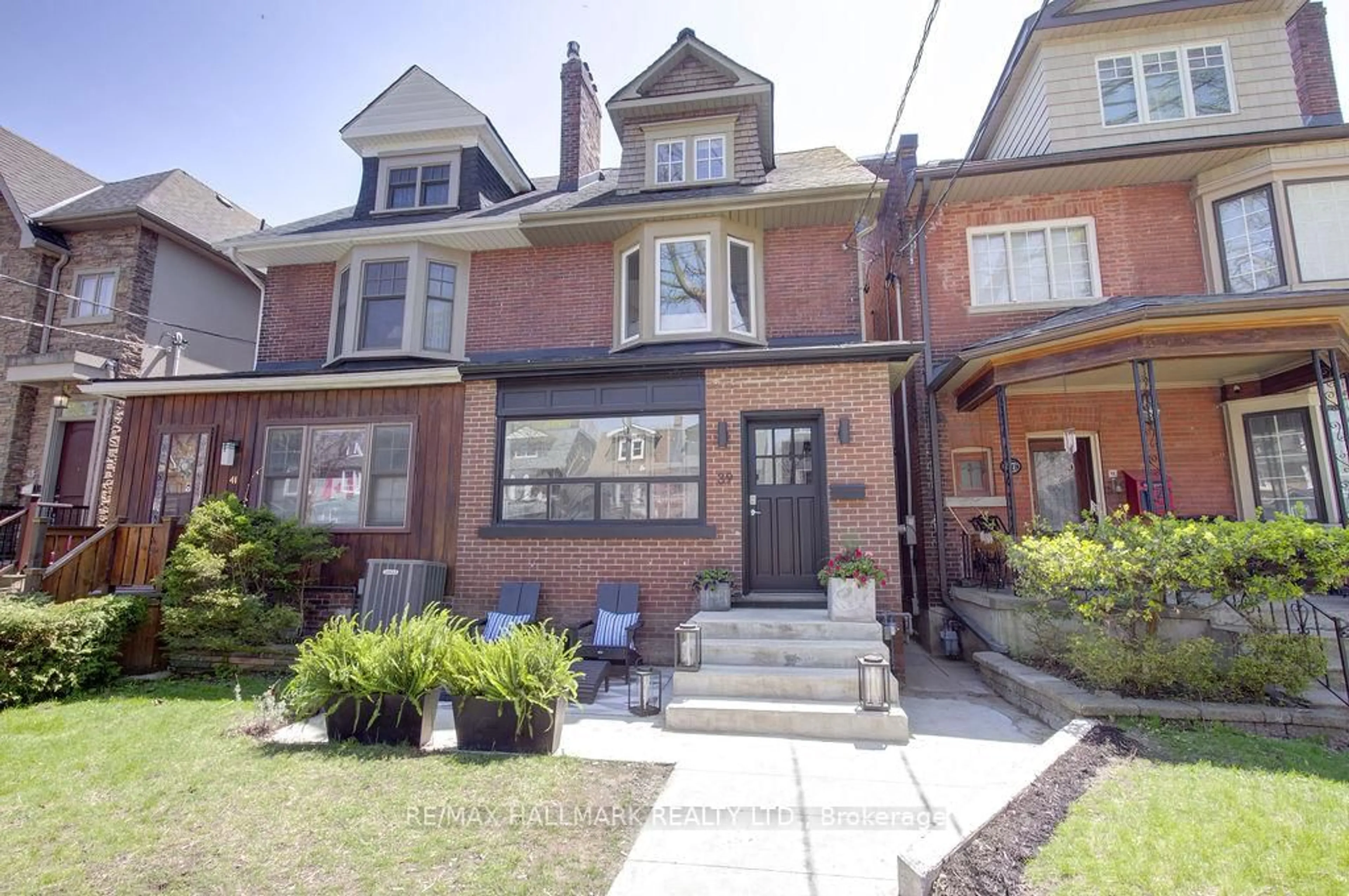 Home with brick exterior material, street for 39 Dixon Ave, Toronto Ontario M4L 1N4