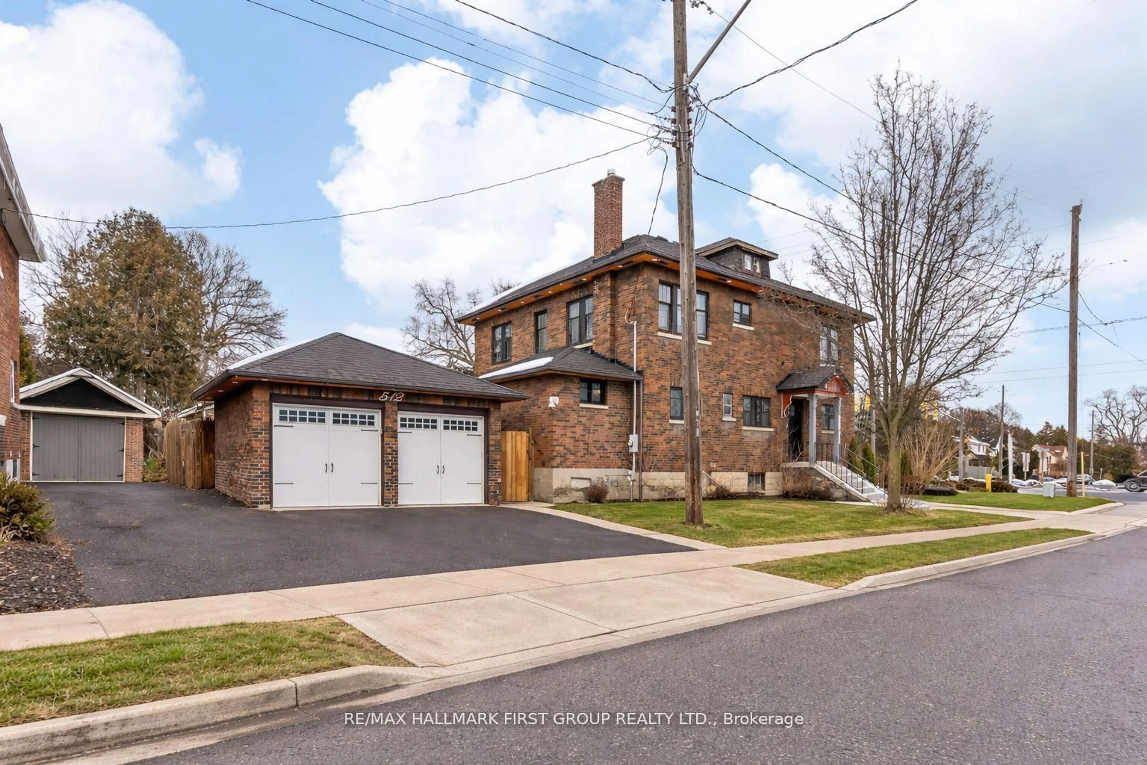 Home with brick exterior material, street for 512 Simcoe St, Oshawa Ontario L1G 4T9